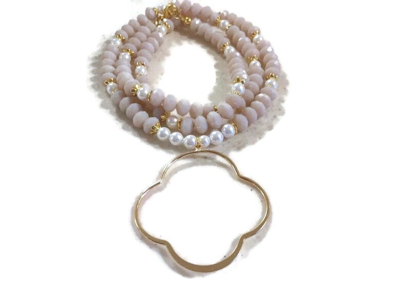 Handmade Cream Crystal Necklace – Gold Quatrefoil Pendant, White Pearls, 29 Inches Handmade Cream Crystal Necklace – Gold Quatrefoil Pendant, White Pearls, 29 Inches