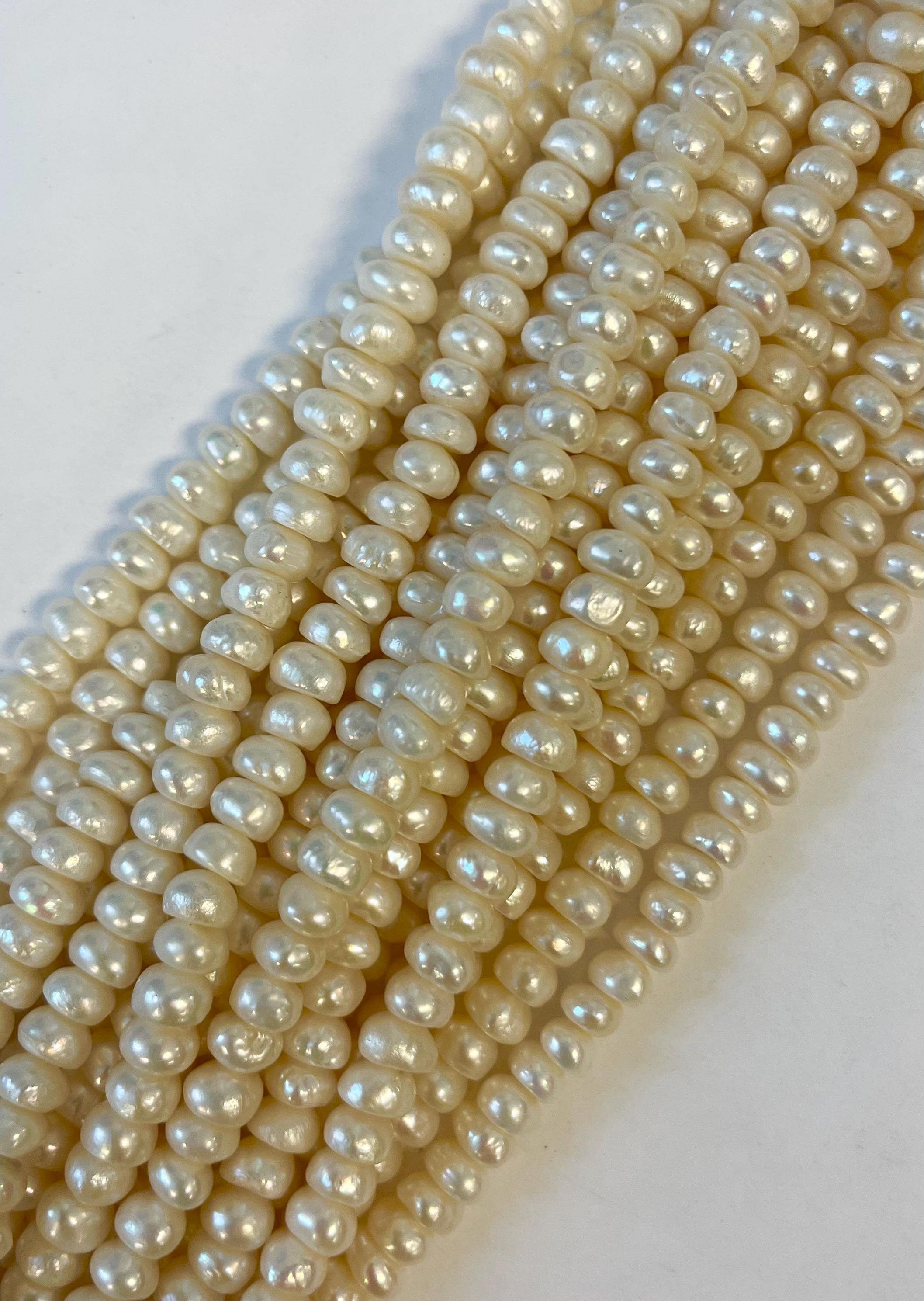 Natural Fresh Water Pearl (7-8)x(4-5)mm Rondelle Pearl Bead--15.5 Inch Strand