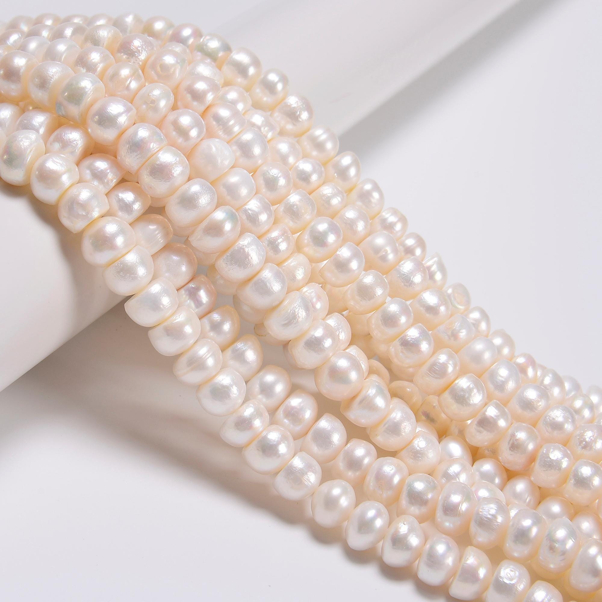 Natural White Fresh Water Pearl Rondelle Button Beads Size 7x10mm 15.5" Strand Natural White Fresh Water Pearl Rondelle Button Beads Size 7x10mm 15.5" Strand