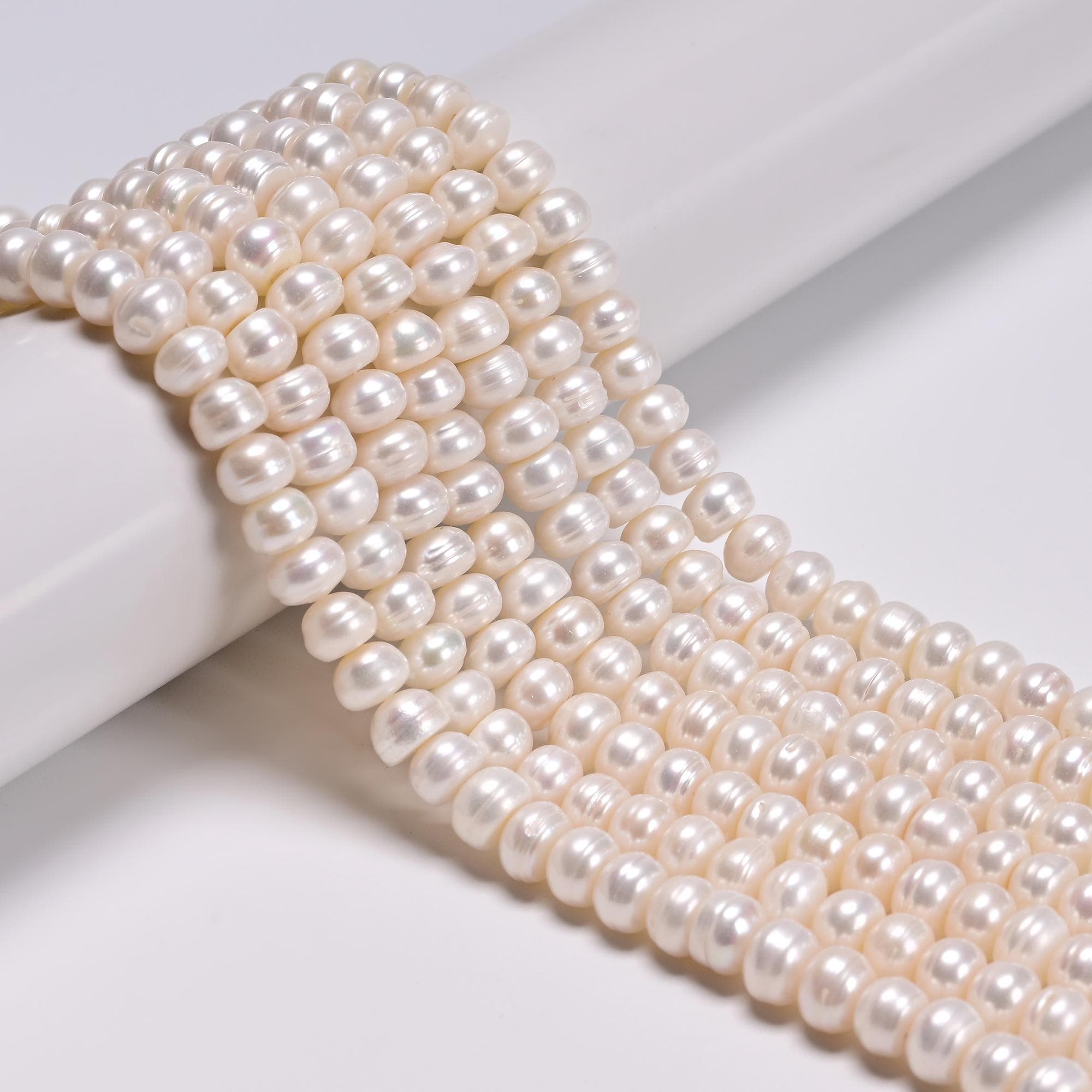 White Freshwater Pearl Rondelle Button Beads 3x5mm 4x6mm 5x7mm 5x8mm 15.5"strand White Freshwater Pearl Rondelle Button Beads 3x5mm 4x6mm 5x7mm 5x8mm 15.5"strand
