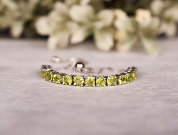 Elegant Peridot Bolo Bracelet: 14k White Gold Overlay, Sterling Silver Elegant Peridot Bolo Bracelet: 14k White Gold Overlay, Sterling Silver