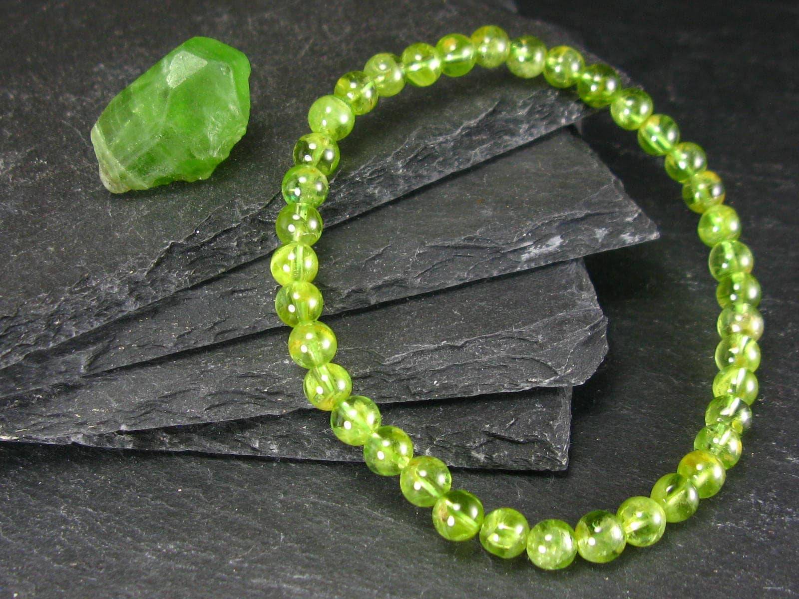 Peridot Genuine Bracelet ~ 7 Inches ~ 5.5mm Round Beads Peridot Genuine Bracelet ~ 7 Inches ~ 5.5mm Round Beads