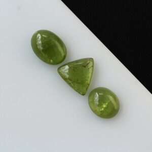 3 Piece Peridot Cabochon Lot, Assorted Shapes and Sizes, Natural Gemstones - 15.89ct 3 Piece Peridot Cabochon Lot, Assorted Shapes and Sizes, Natural Gemstones - 15.89ct