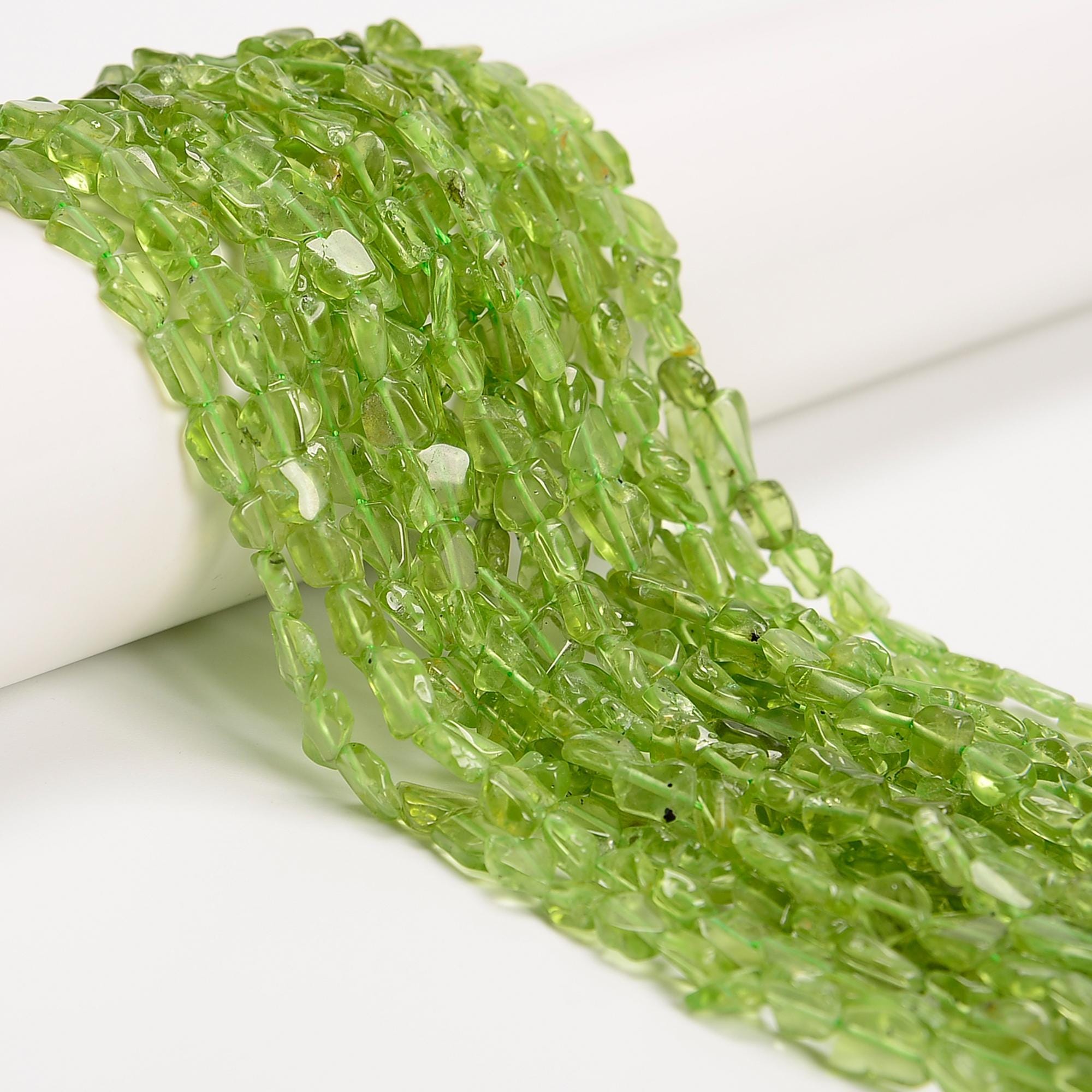 Natural Peridot Flat Nugget Beads Size 5-6mm X 5-8mm 15.5'' Strand Natural Peridot Flat Nugget Beads Size 5-6mm X 5-8mm 15.5'' Strand