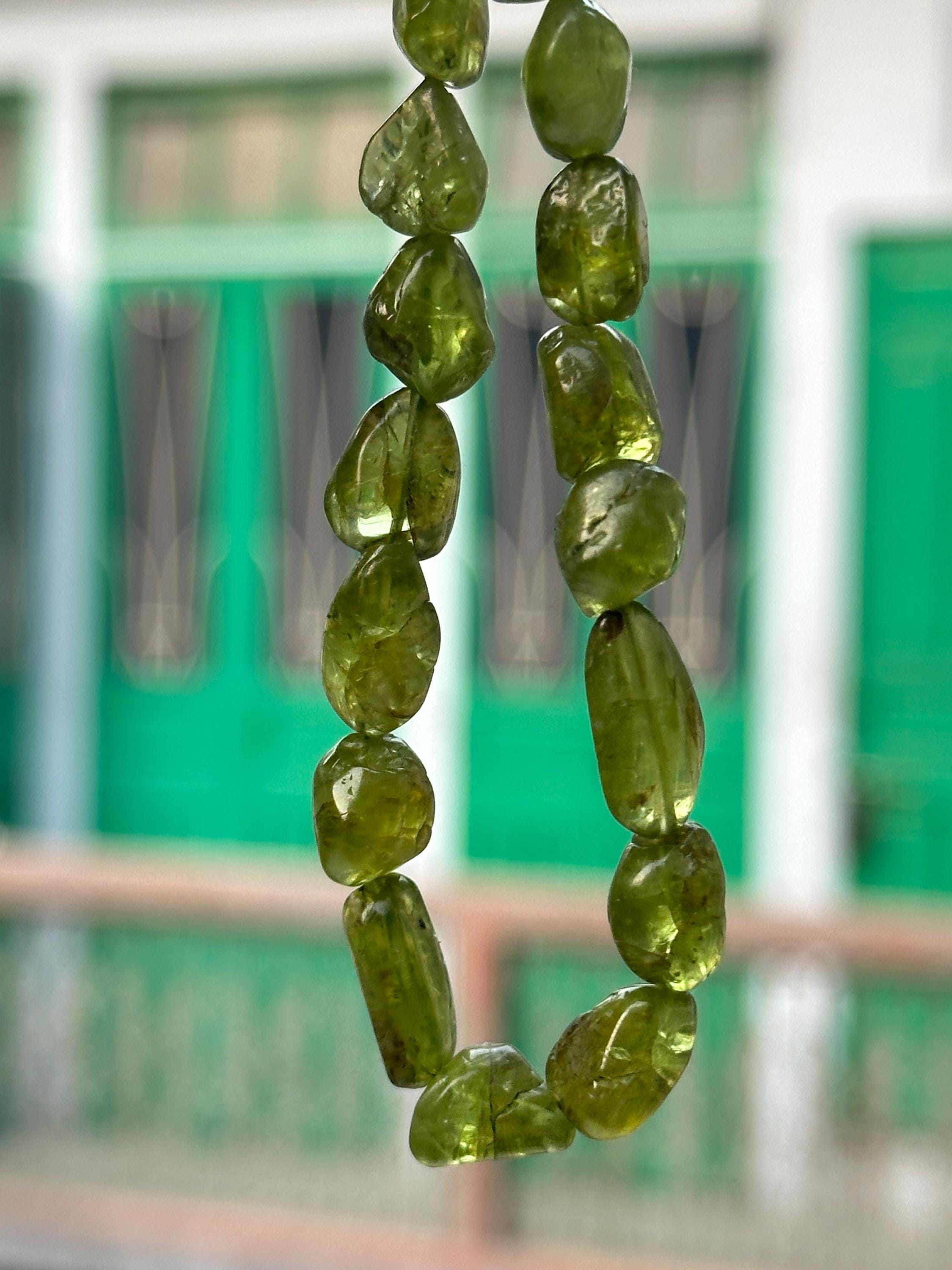 Natural Peridot Tumble Beads: 10x8 To 15x10mm, 8" Strand