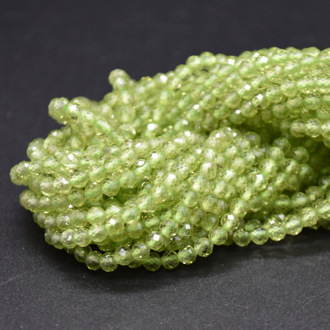 3mm Or 3.5mm Peridot Gemstone Faceted Round Beads - 15" Strand 3mm Or 3.5mm Peridot Gemstone Faceted Round Beads - 15" Strand