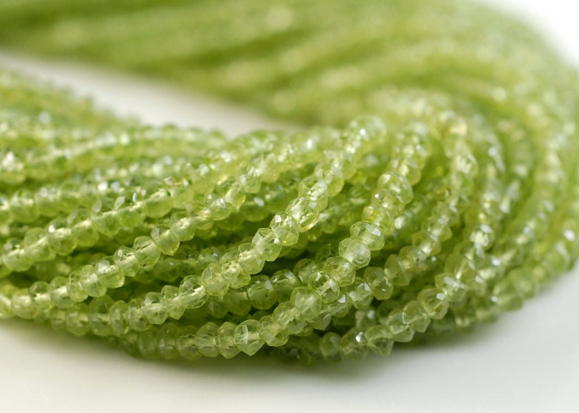 3x2mm Peridot Gemstone Green Grade Aaa Faceted Rondelle Loose Beads 13 Inch Full Strand (90184336-852) 3x2mm Peridot Gemstone Green Grade Aaa Faceted Rondelle Loose Beads 13 Inch Full Strand (90184336-852)