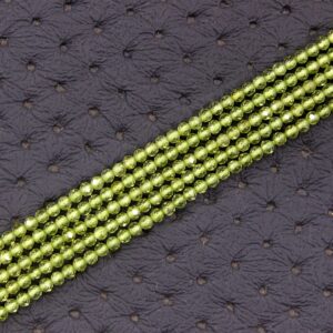 Natural Peridot Gemstone Beads: Faceted Rondelle, 2mm, 13" Strand Natural Peridot Gemstone Beads: Faceted Rondelle, 2mm, 13" Strand
