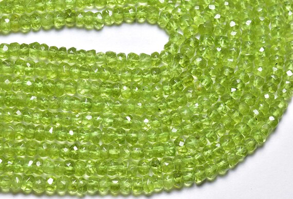 Peridot Rondelle Beads - 14 Inches - Natural Faceted Peridot Rondelle - Finest Quality - Size Is 4.50mm #1545 Peridot Rondelle Beads - 14 Inches - Natural Faceted Peridot Rondelle - Finest Quality - Size Is 4.50mm #1545