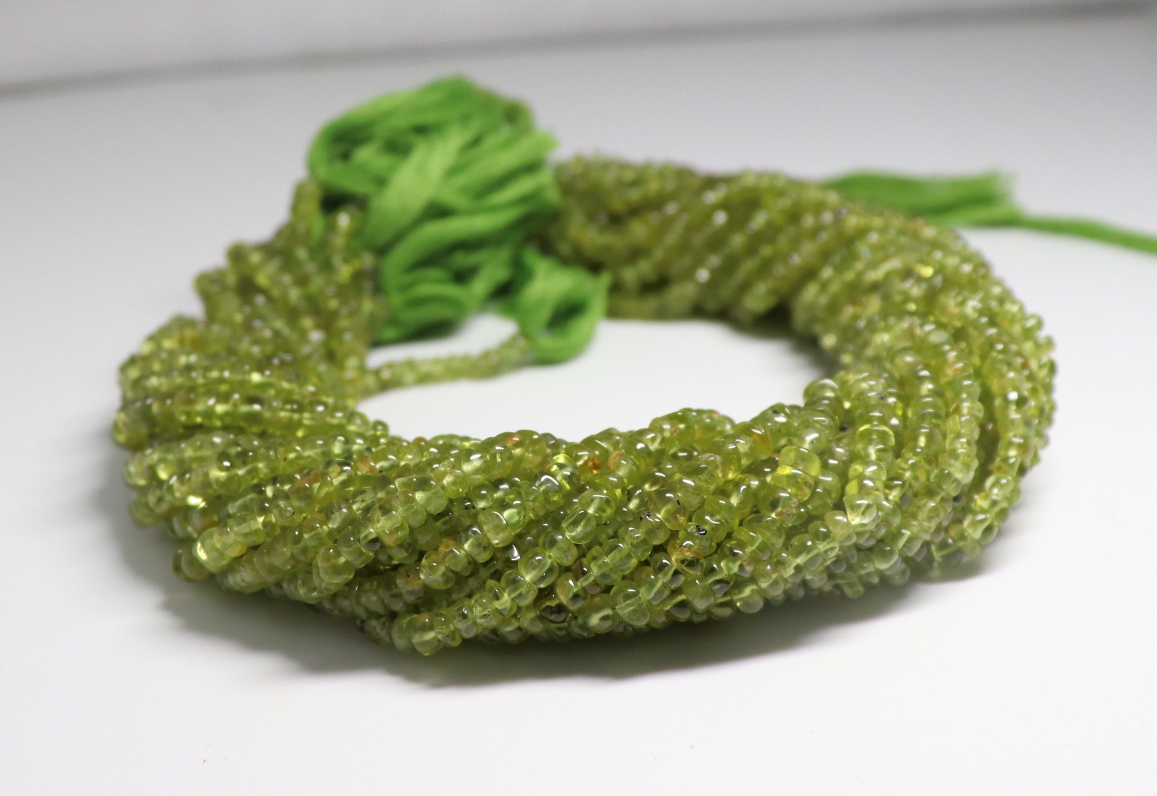 Aaa Natural Peridot Smooth Rondelle Beads, Smooth Peridot, Rondelle Periodot, Smooth Beads, 4-4.5 Mm Peridot Beads Aaa Natural Peridot Smooth Rondelle Beads, Smooth Peridot, Rondelle Periodot, Smooth Beads, 4-4.5 Mm Peridot Beads
