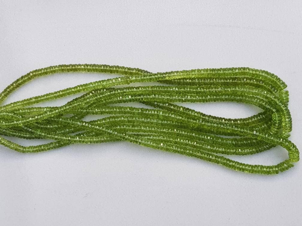 Bead Peridot Tyre Facetted 5 To 6mm 8" Each