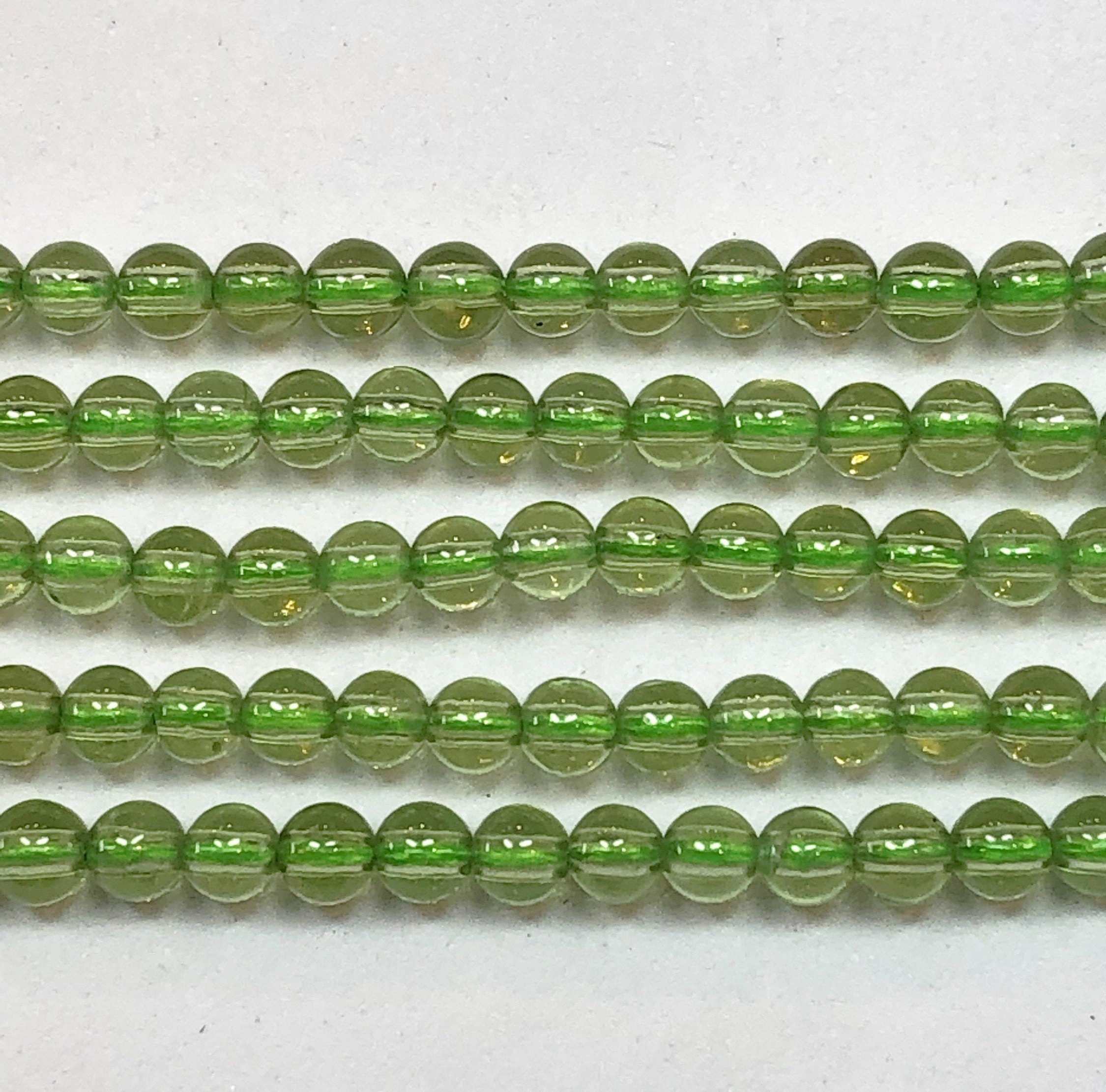 3mm Peridot Gemstone Beads. 15.5" Strand Of 4mm Smooth Round Beads. Very Uniform Is Size And Shape. August Birthstone.