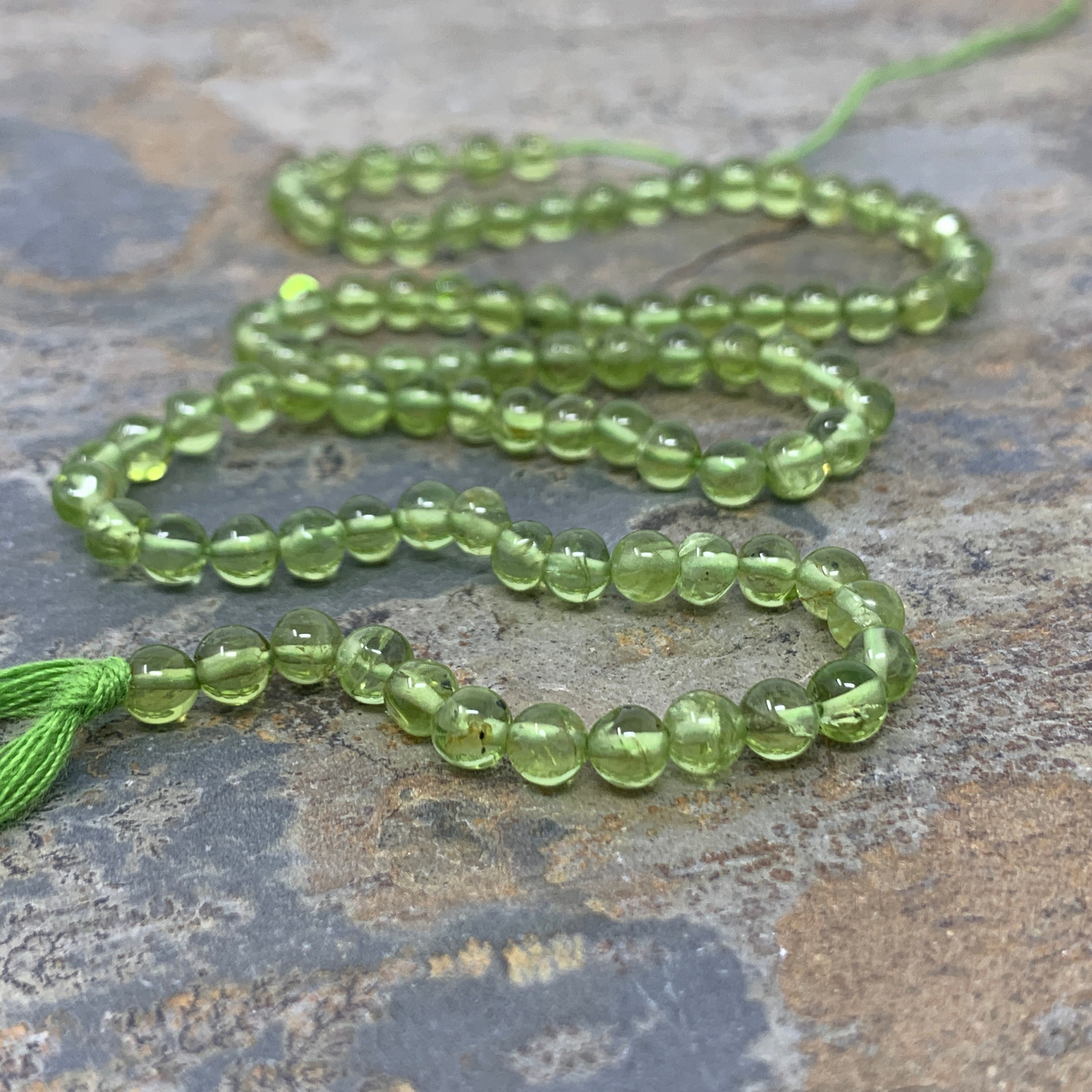 Round Peridot Beads, 4mm, 12.5 Inch Strand