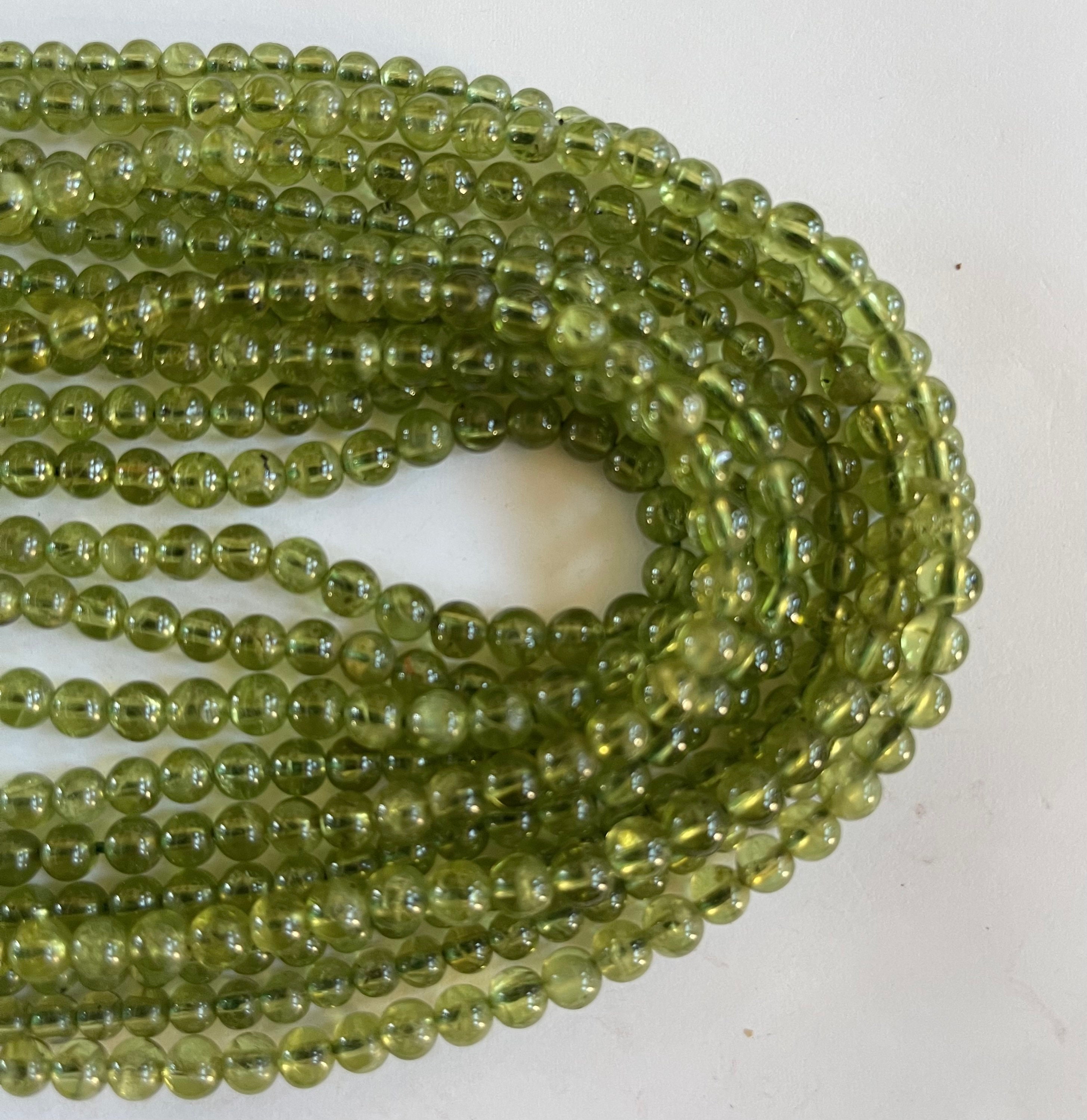 Natural Peridot 4mm 5mm Round Gemstone Beads--15.5" Natural Peridot 4mm 5mm Round Gemstone Beads--15.5"