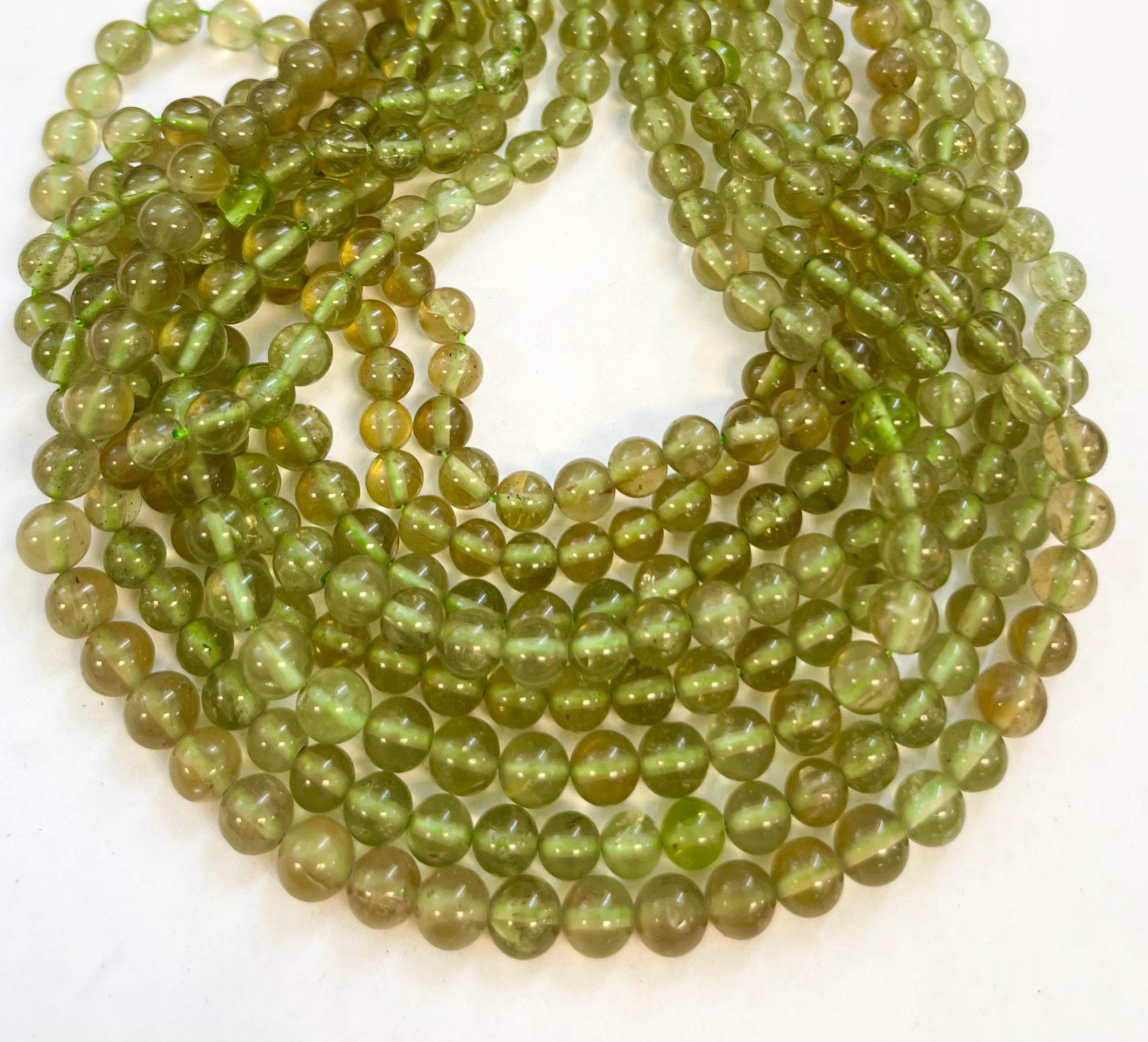 Natural Peridot 6mm Round Gemstone Beads--15.5 Inch Strand Natural Peridot 6mm Round Gemstone Beads--15.5 Inch Strand