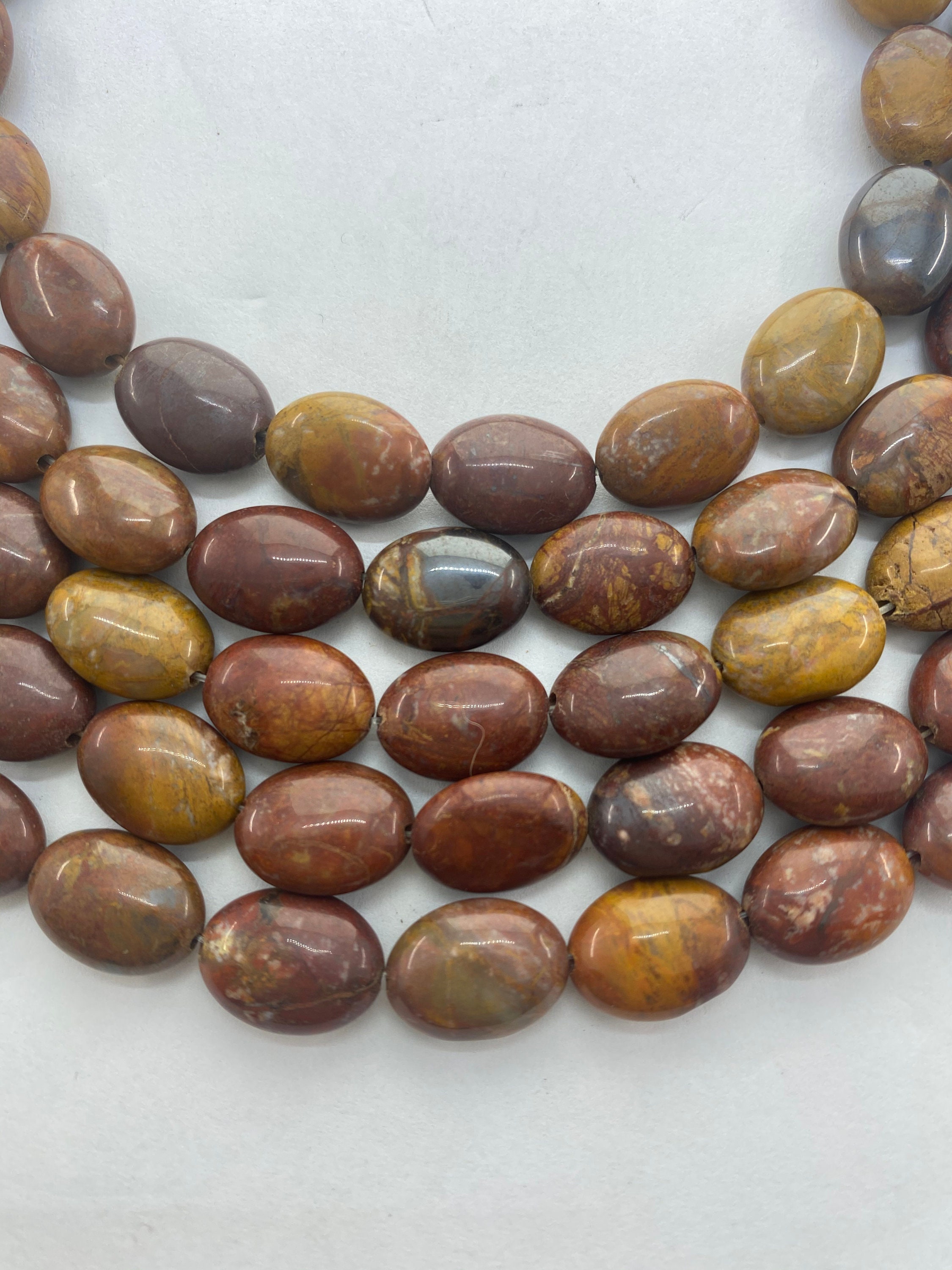10x14mm Oval Red Wooden Jasper Beads. 15" Strand Of High Quality Beads, 29 Per Strand. Petrified Wood. Also Called Wooden Agate.