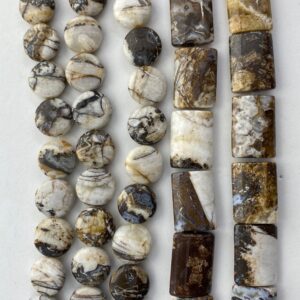 Brown and White Brioche Agate Gemstone Beads. Available in two shapes: 14mm coin and 15x20mm rectangle. 15” strands of petrified wood.