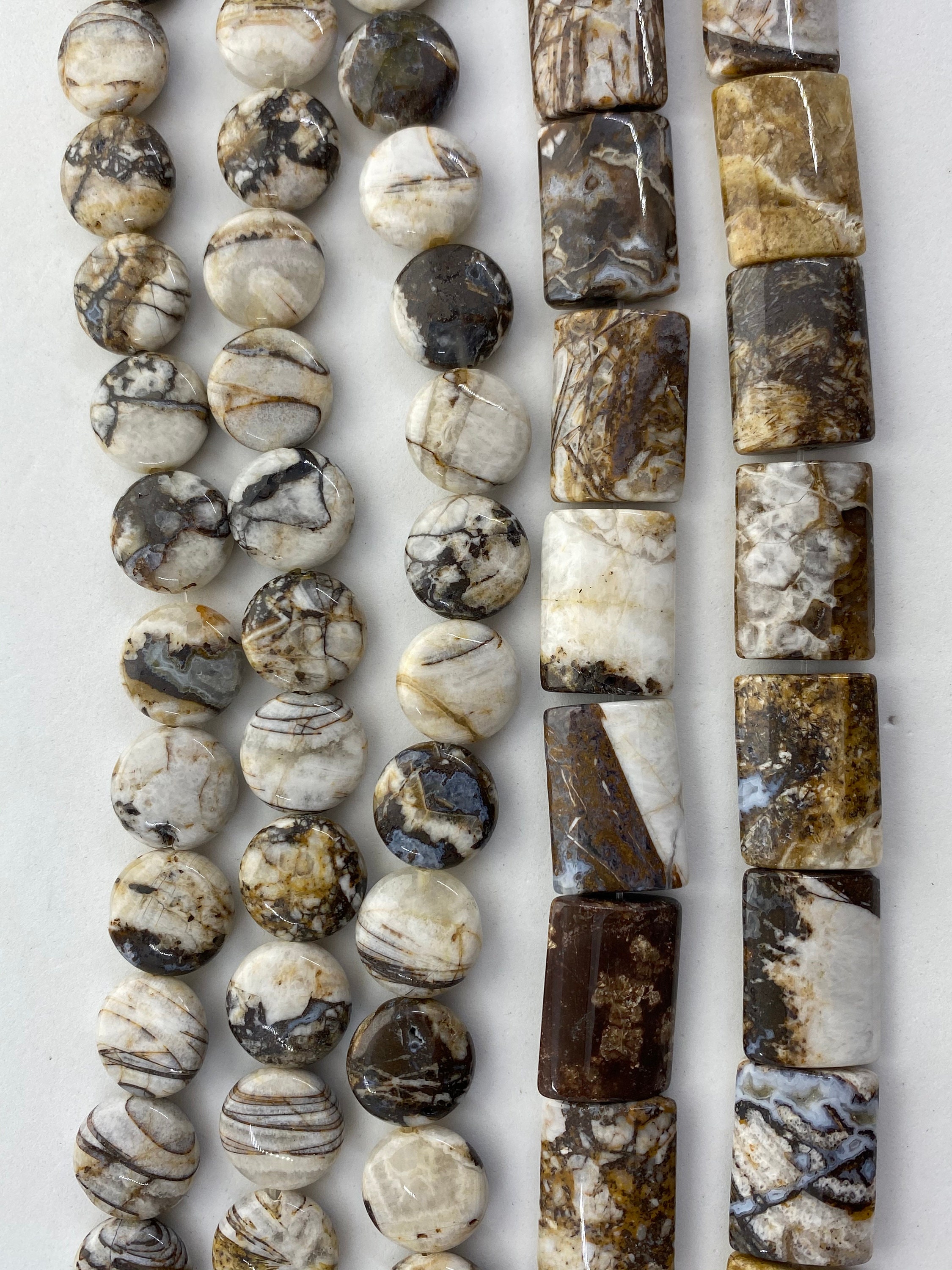 Brown And White Brioche Agate Gemstone Beads. Available In Two Shapes: 14mm Coin And 15x20mm Rectangle. 15” Strands Of Petrified Wood.