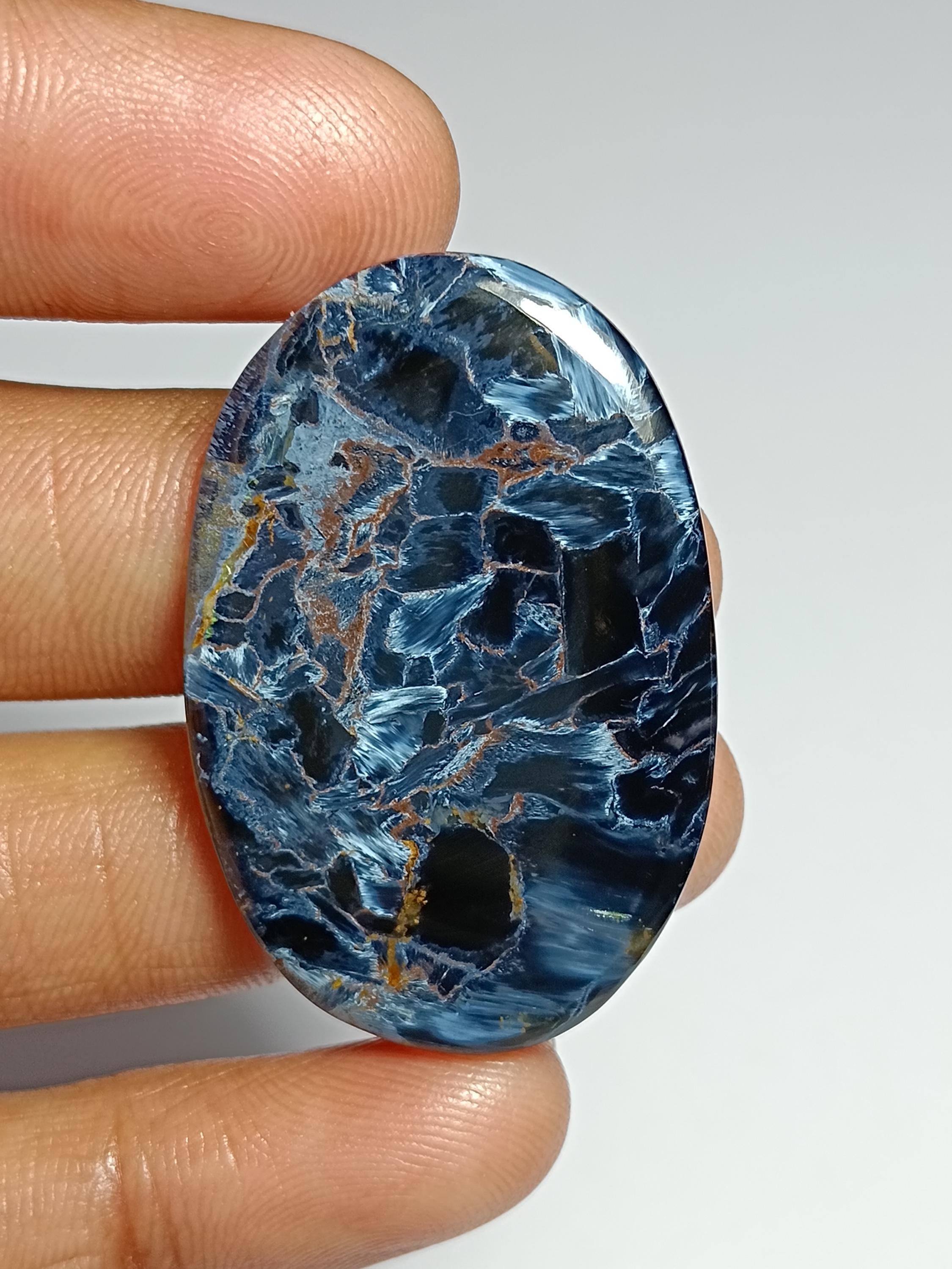 Natural Pietersite Cabochon: Handmade Polished Gemstone (40x25 Mm) Natural Pietersite Cabochon: Handmade Polished Gemstone (40x25 Mm)