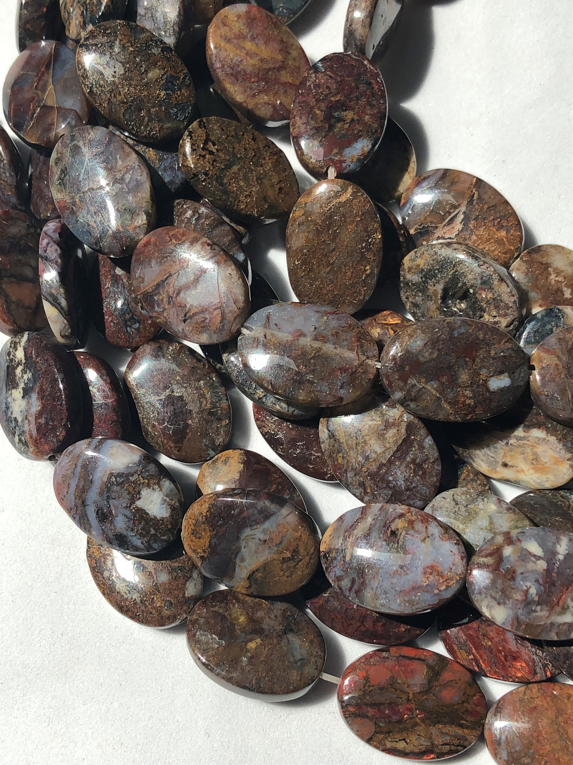 Pietersite Gemstone Beads. Full 15" Strand Of 13x18mm Oval Shaped Beads, About 24 Beads. Mixed Gold, Red And Browns With Some Flash. Pietersite Gemstone Beads. Full 15" Strand Of 13x18mm Oval Shaped Beads, About 24 Beads. Mixed Gold, Red And Browns With Some Flash.