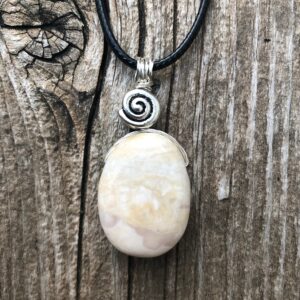 Pink Calcite Pendant: Swirl Stone for Hope & Awareness