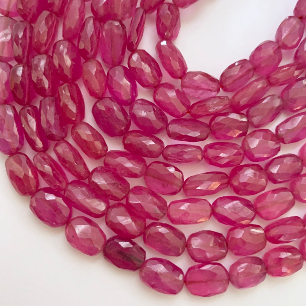 1/2 Strands Of Faceted Pink Sapphire Nuggets