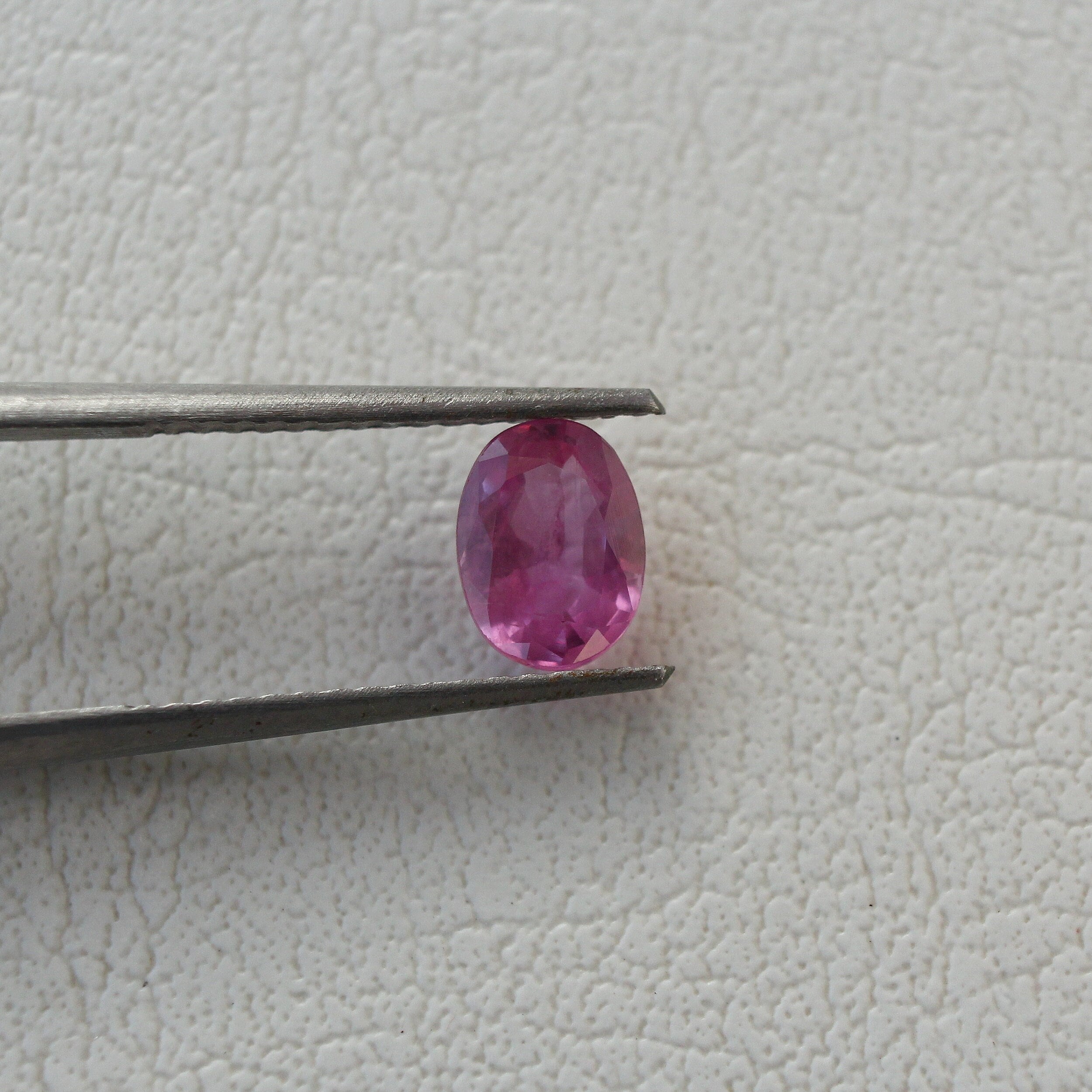 Natural Pink Sapphire Loose Gemstone - 0.89ct, 5x6mm - Oval Cut From Sri Lanka Mines Natural Pink Sapphire Loose Gemstone - 0.89ct, 5x6mm - Oval Cut From Sri Lanka Mines