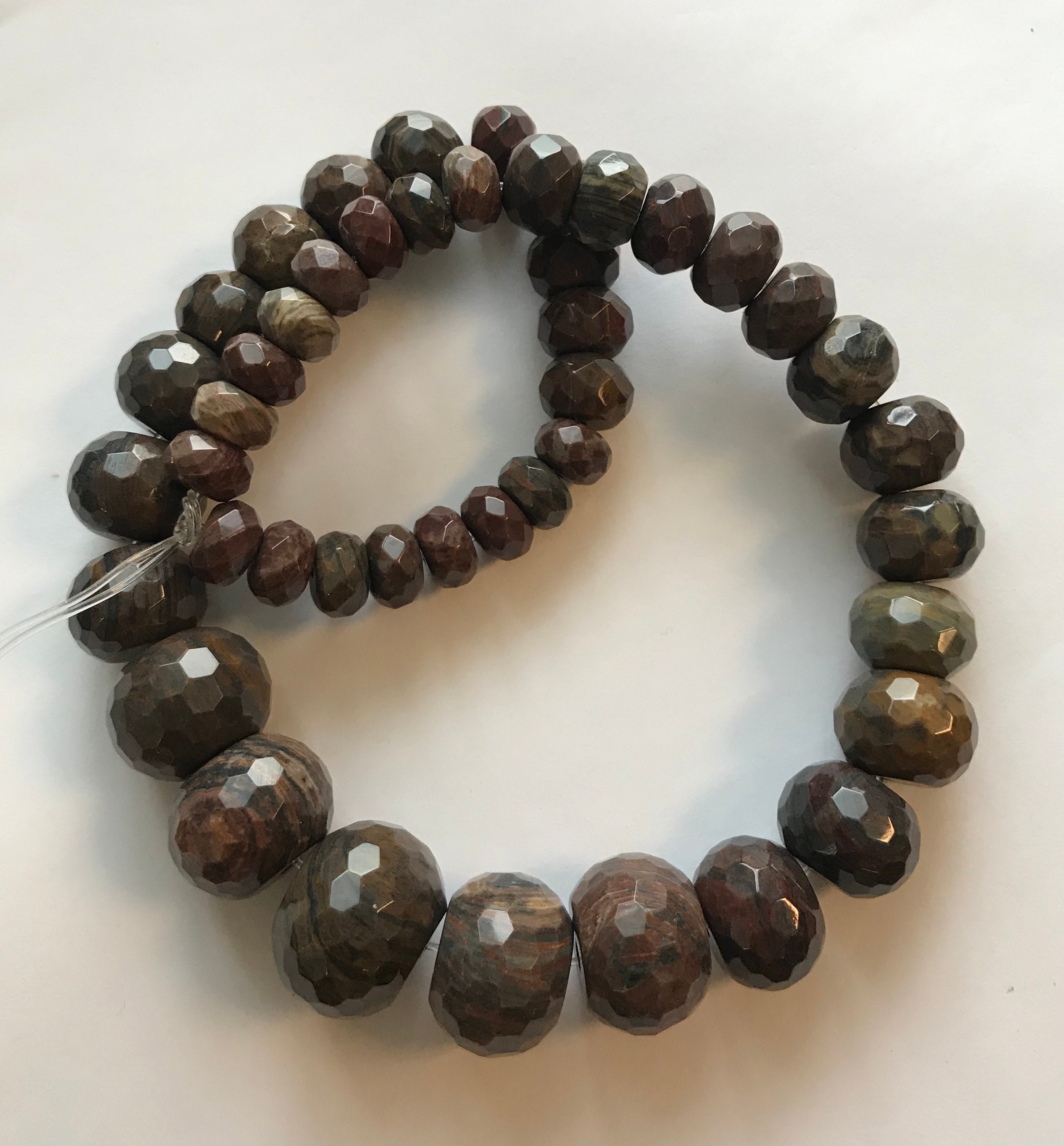 Pitersite 5x3mm--14x10mm Faceted Graduated Rondelle Gemstone Bead -15.5 Inch Strand Pitersite 5x3mm--14x10mm Faceted Graduated Rondelle Gemstone Bead -15.5 Inch Strand