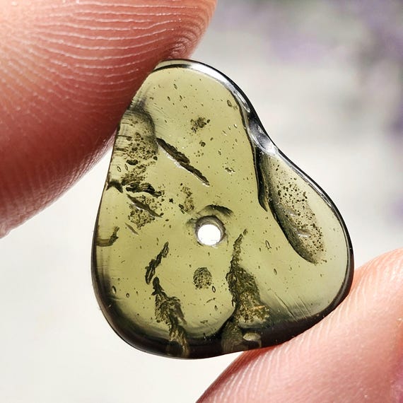 Polished Moldavite Bead: Authentic Czech Tektite Crystal (1.5g, 18x15x3mm) Polished Moldavite Bead: Authentic Czech Tektite Crystal (1.5g, 18x15x3mm)