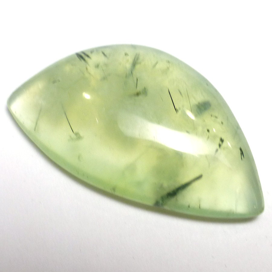 55.08 Carats Prehinite Cabochon Natural Australian Prehnite Translucent Light Green Mint Tourmilinated Black Strands Pendant Jewelry 55.08 Carats Prehinite Cabochon Natural Australian Prehnite Translucent Light Green Mint Tourmilinated Black Strands Pendant Jewelry