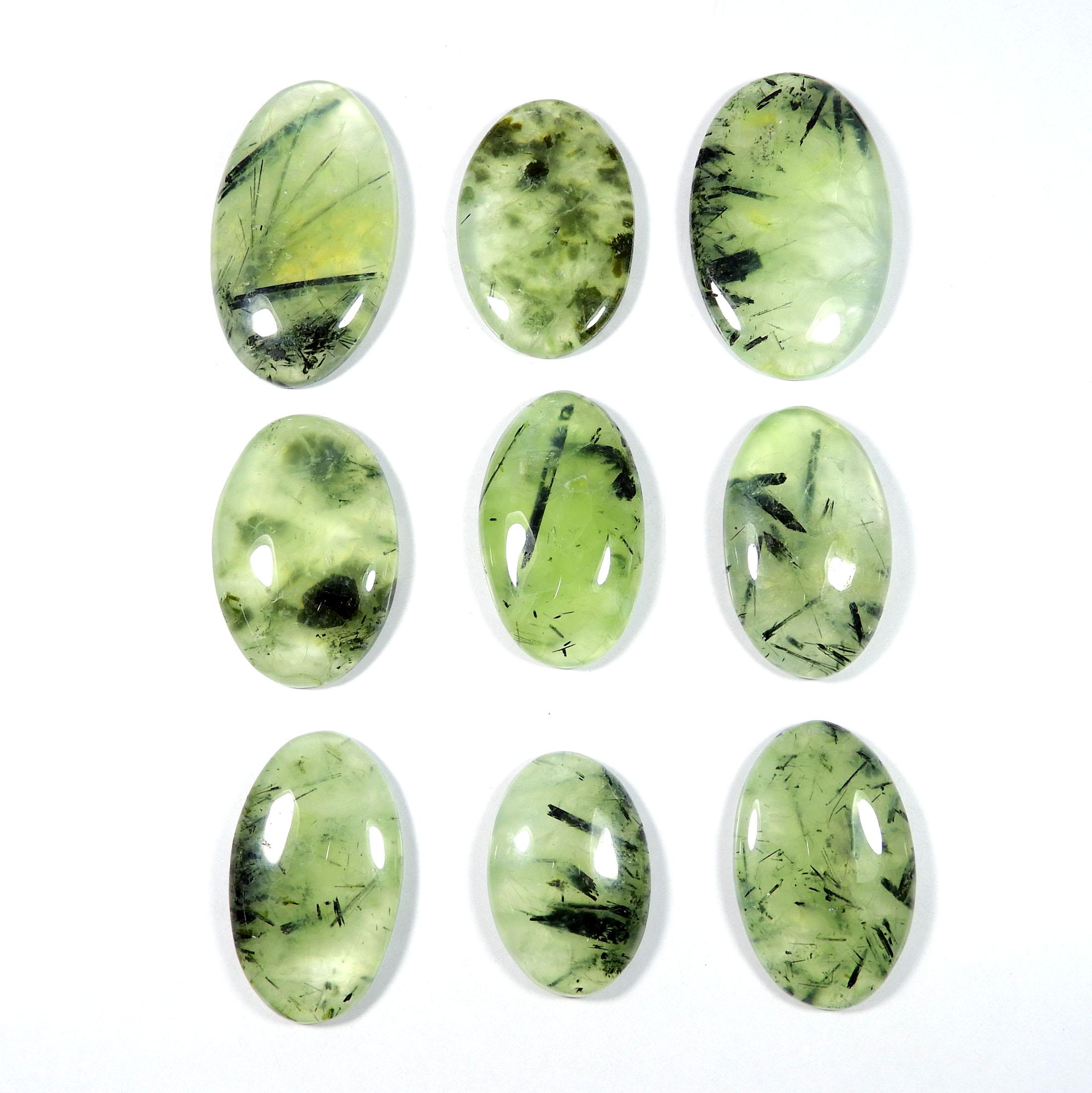 Green Prehnite Cabochon. Natural Black Needle Prehnite. Green Rutlated Prehnite Gemstone. Oval Shape Wholesale Polished Prehnite For Jewelry Green Prehnite Cabochon. Natural Black Needle Prehnite. Green Rutlated Prehnite Gemstone. Oval Shape Wholesale Polished Prehnite For Jewelry