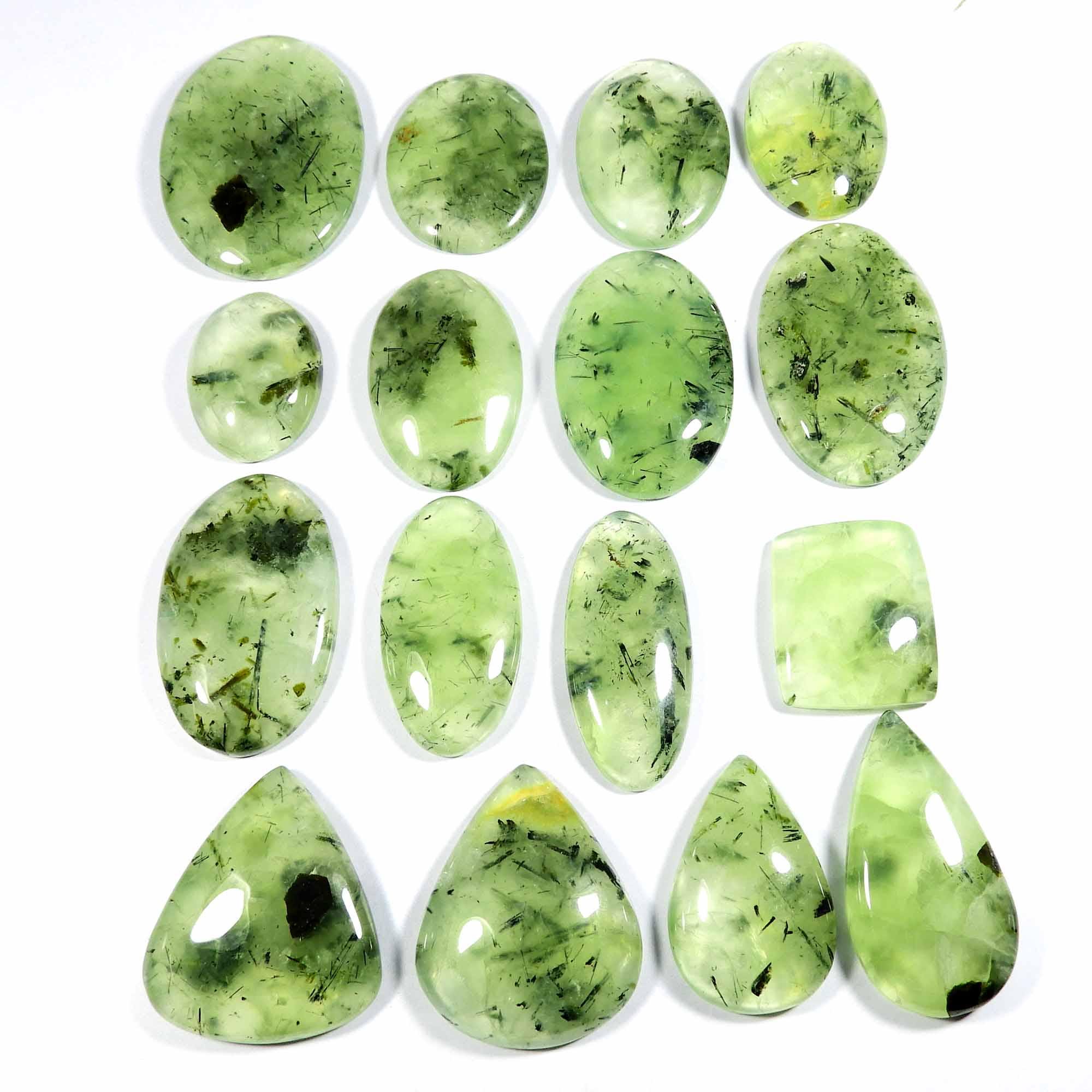 Natural Black Needle Prehnite. Green Prehnite Cabochon. Green Rutlated Prehnite Gemstone. Wholesale Polished Prehnite For Jewelry. Natural Black Needle Prehnite. Green Prehnite Cabochon. Green Rutlated Prehnite Gemstone. Wholesale Polished Prehnite For Jewelry.