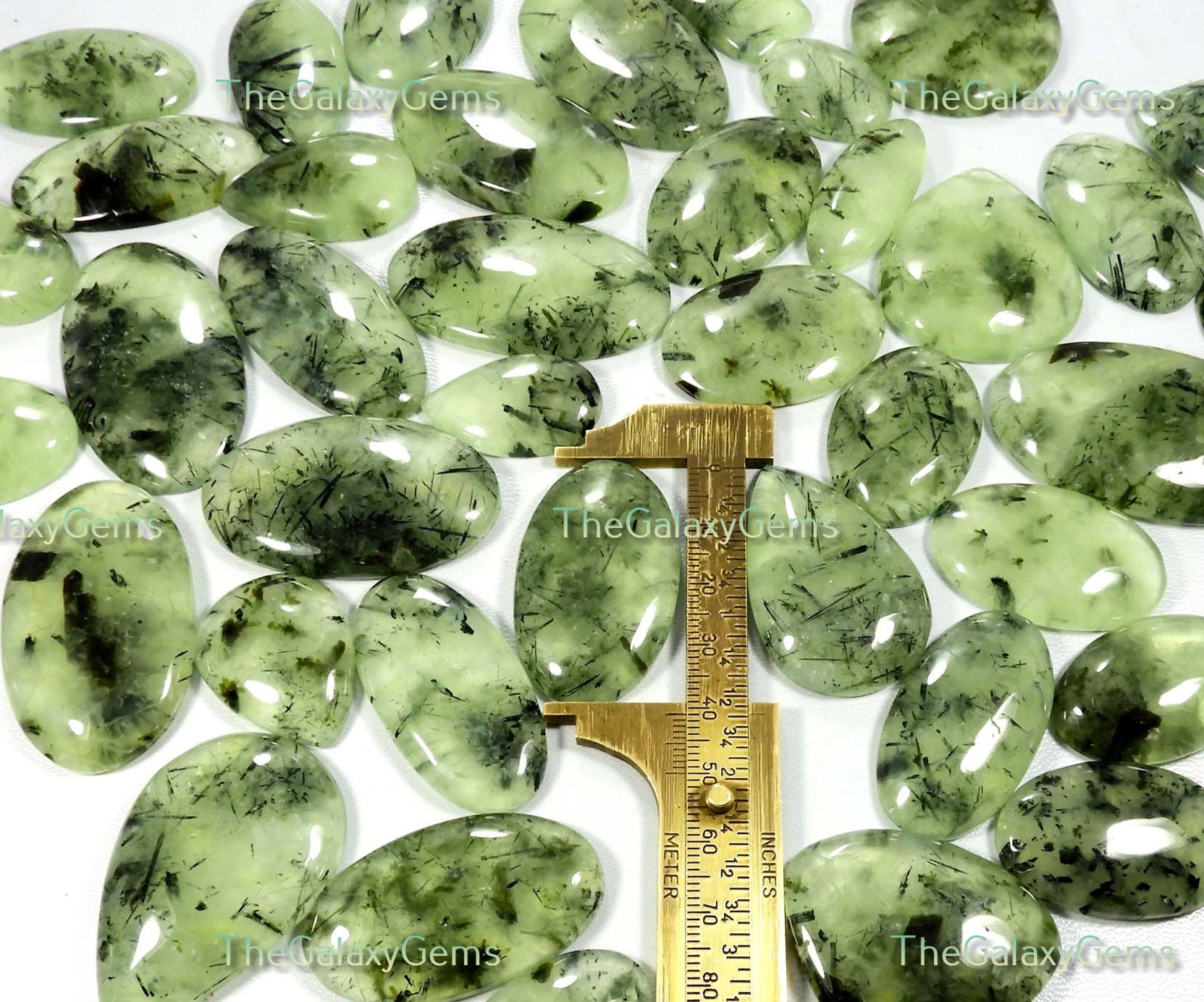 Natural Green Prehnite Cabochon. Prehnite Gemstone Wholesale Bulk Lot. Black Needle Rutlated Prehnite. Prehnite For Jewelry Up To 5000 Cts.