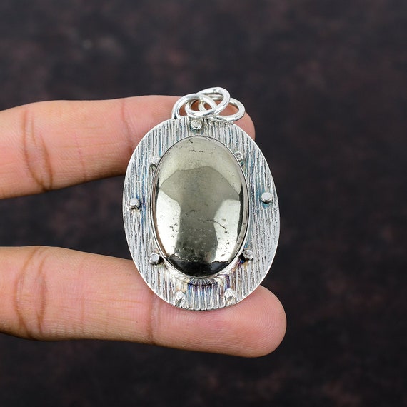 Handmade Apache Pyrite Pendant: Oval Gemstone, 925 Sterling Silver Handmade Apache Pyrite Pendant: Oval Gemstone, 925 Sterling Silver