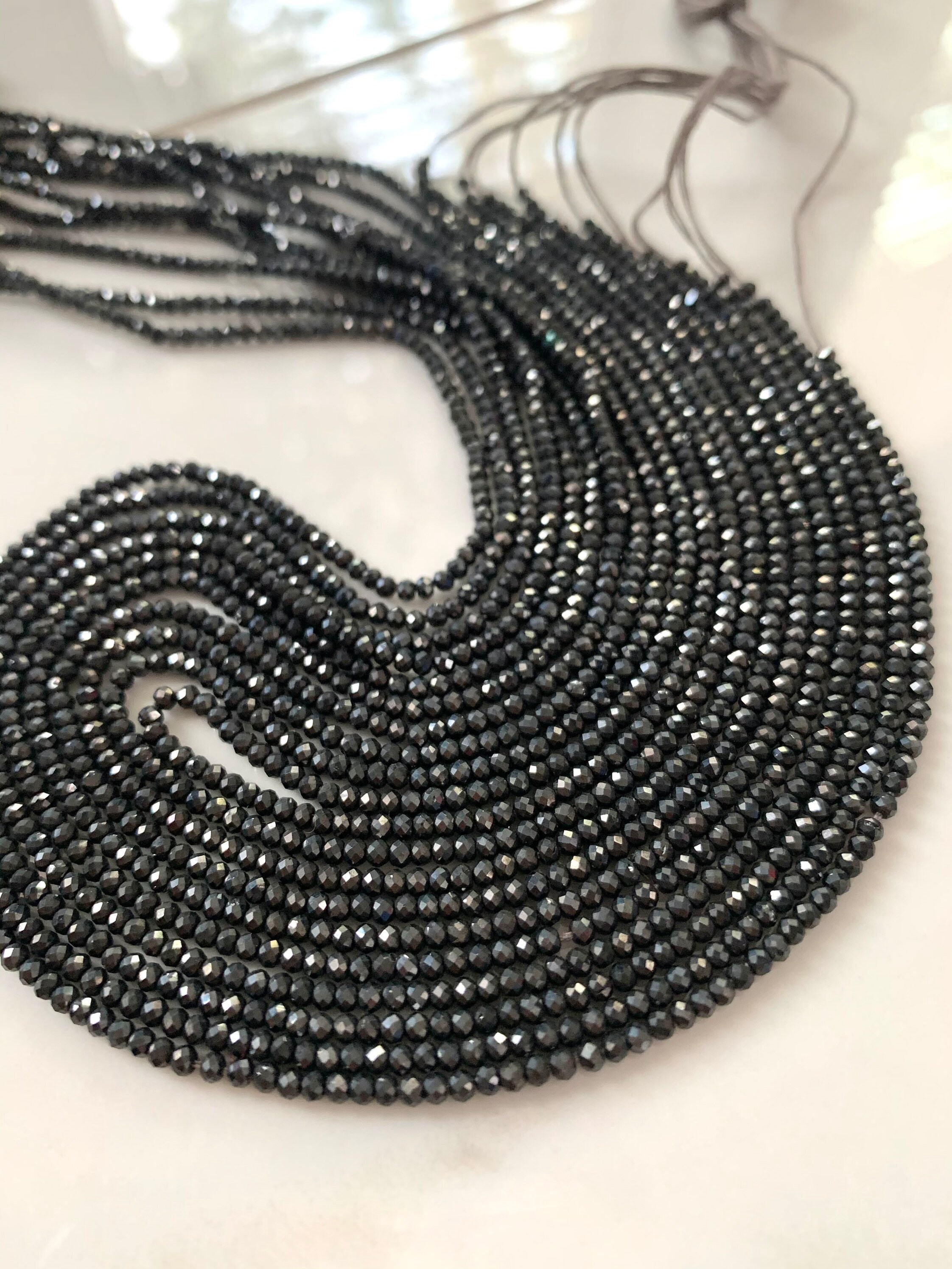 1/2 Strand Of Black Pyrite Roundels