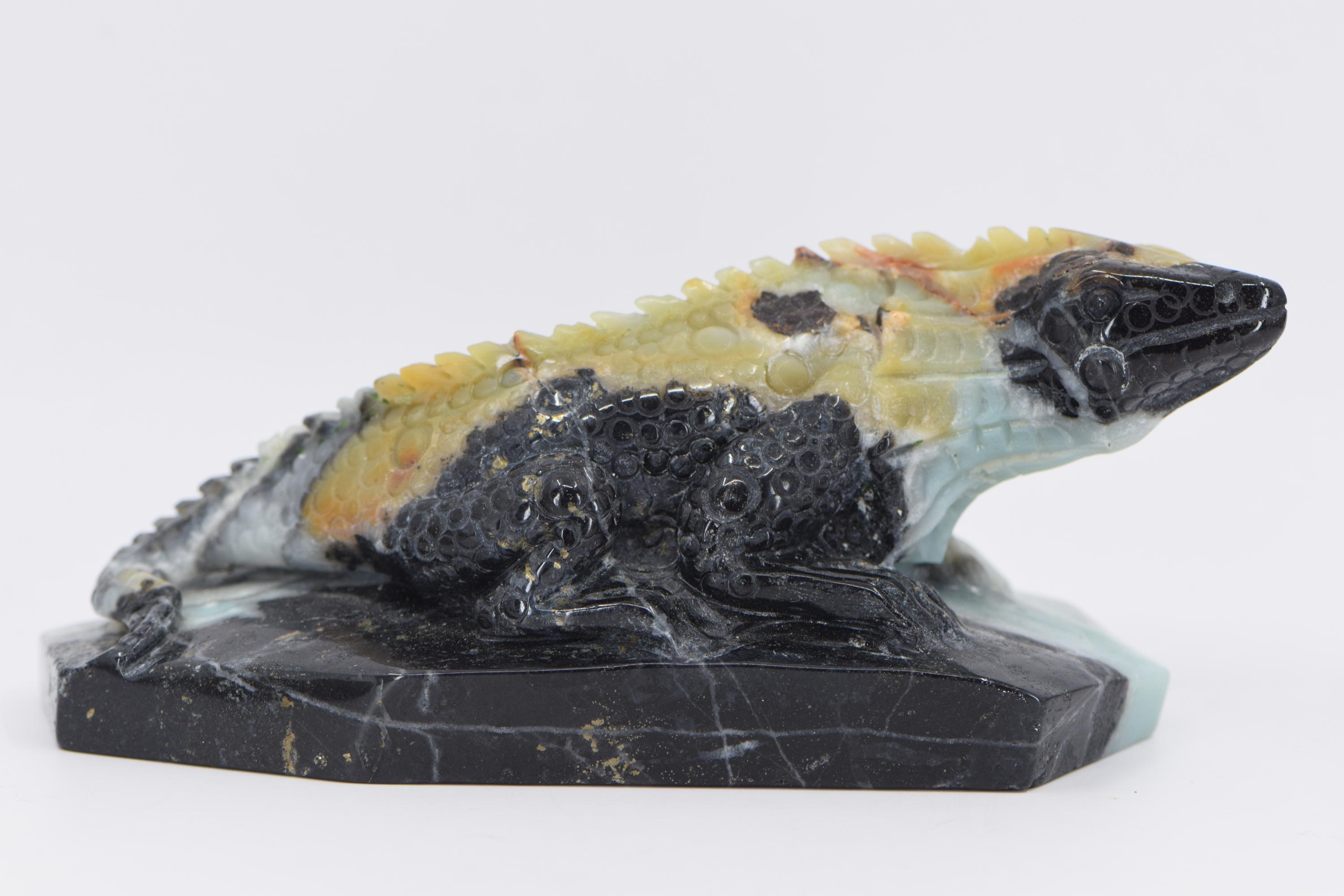 Lizard Carved From Azumar With Pyrite In Black Matrix Stone
