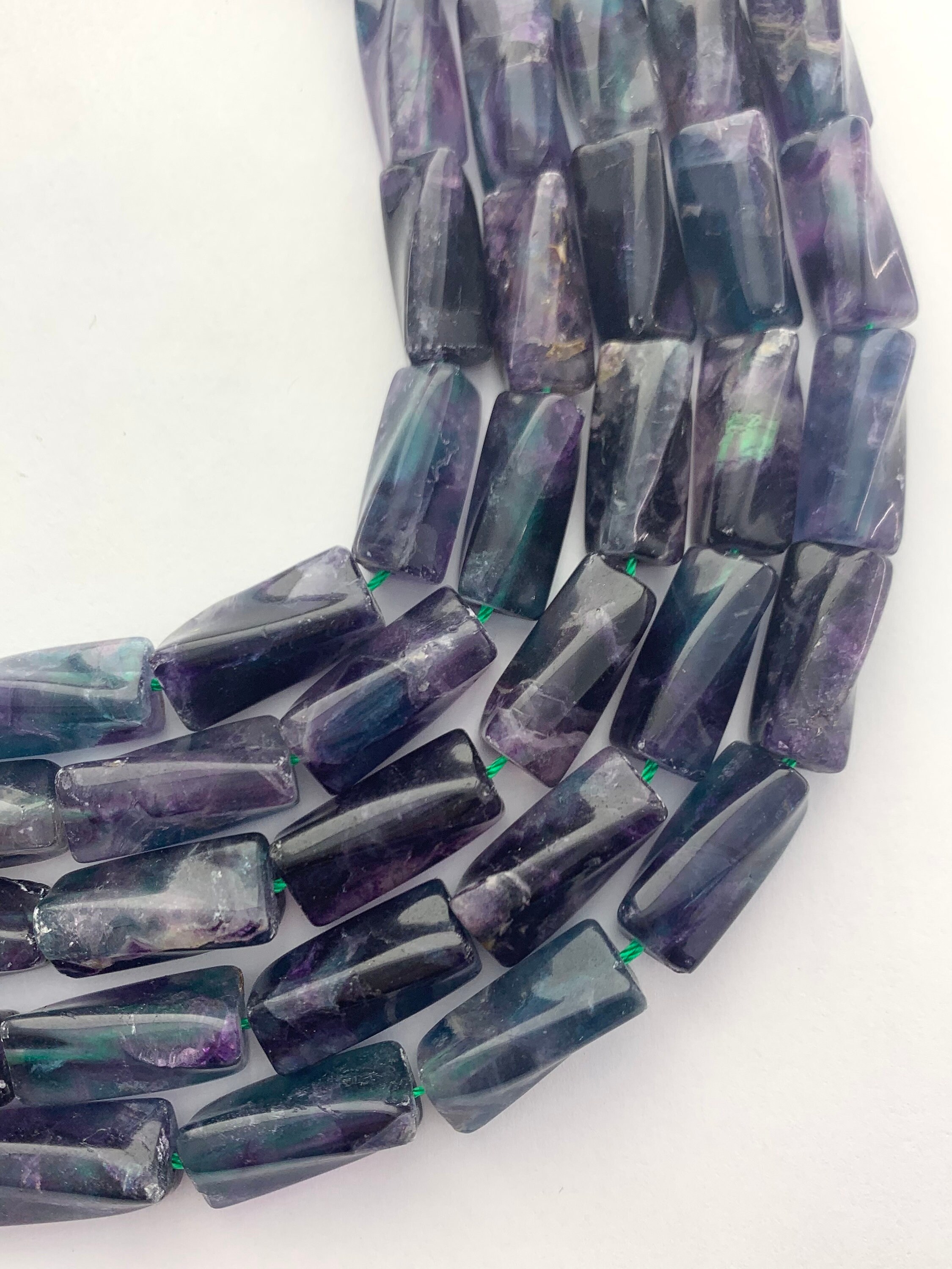 9x20mm Reverse Tube Fluorite Gemstone Beads. 15" Strand Of High Quality Beads, 20 Per Strand. Rainbow Fluorite. 9x20mm Reverse Tube Fluorite Gemstone Beads. 15" Strand Of High Quality Beads, 20 Per Strand. Rainbow Fluorite.