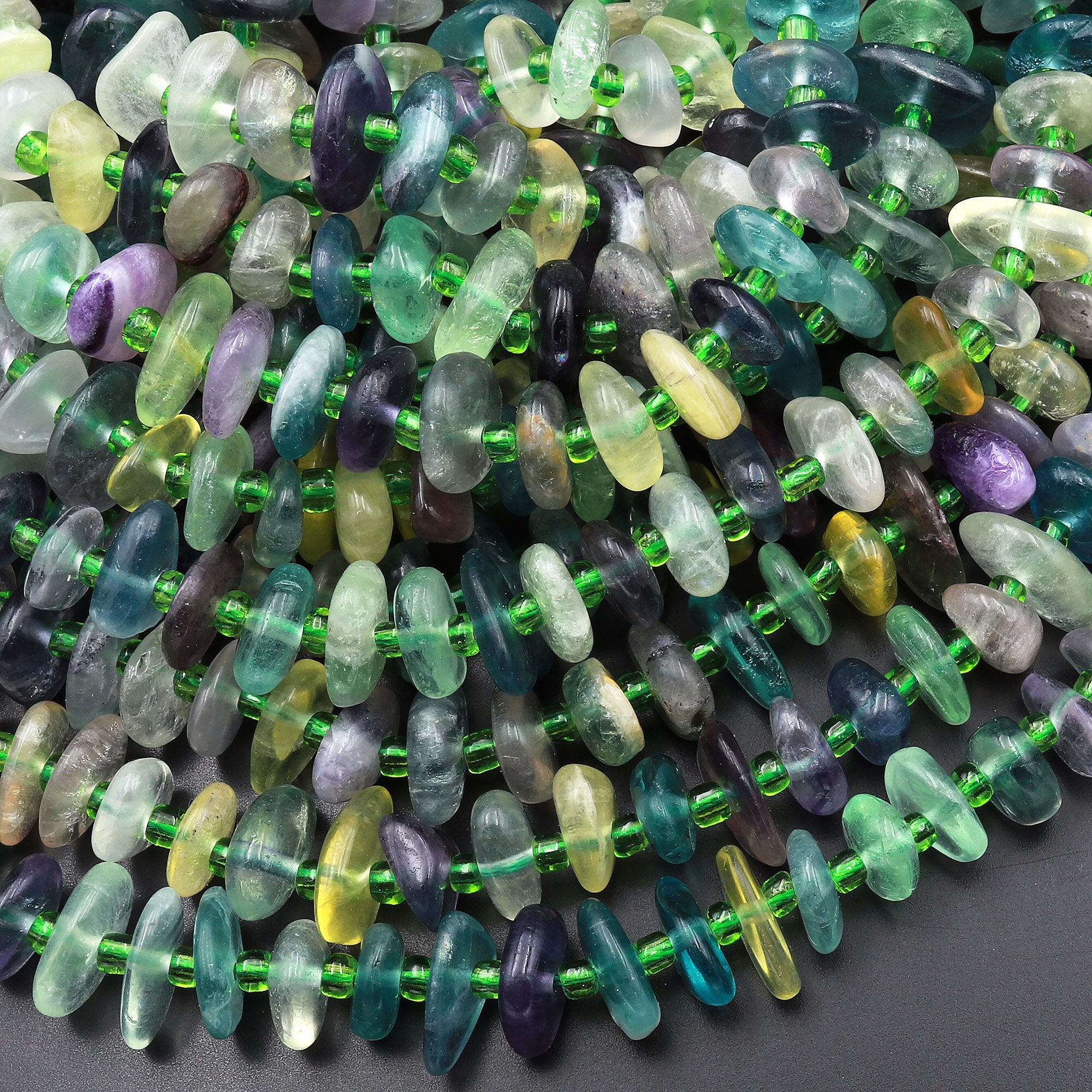 Rainbow Fluorite Purple Green Blue Yellow Freeform Rondelle Beads 15.5" Strand Rainbow Fluorite Purple Green Blue Yellow Freeform Rondelle Beads 15.5" Strand