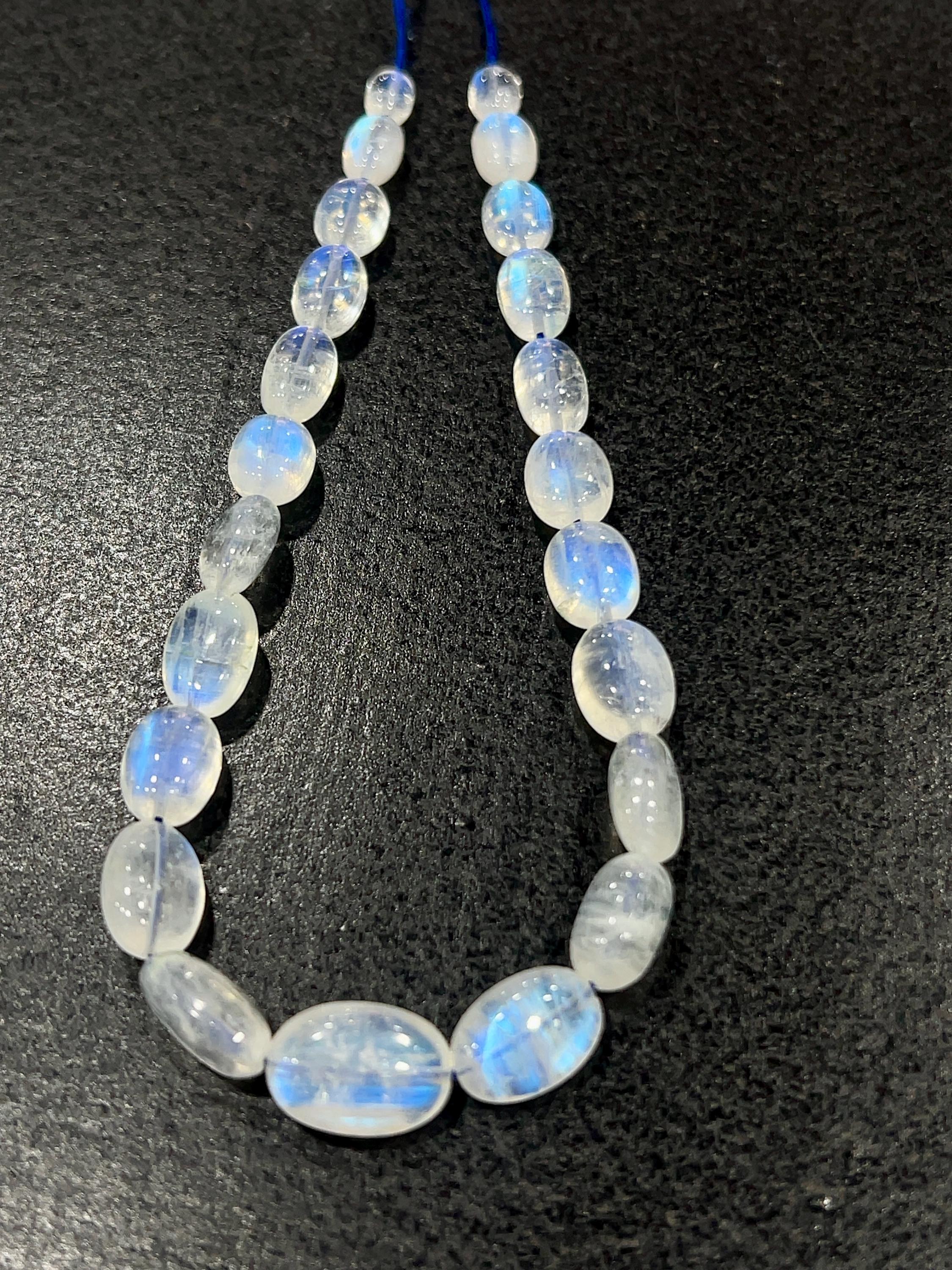 Blue Fire Rainbow Moonstone Beads: Oval Nugget Strand, 8 Inch Blue Fire Rainbow Moonstone Beads: Oval Nugget Strand, 8 Inch