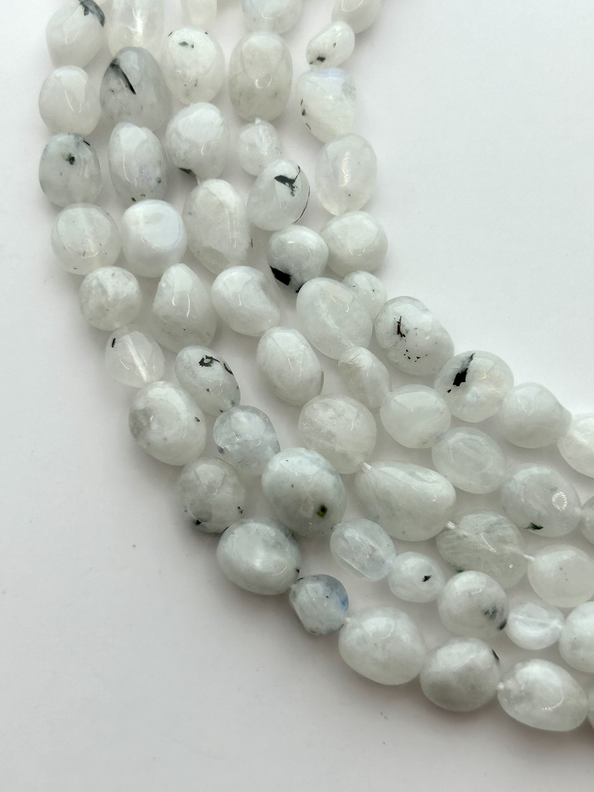 Free Form Rainbow Moonstone Gemstone Nuggets. 15” Strand Of 5-10mm Nugget Beads, Approx. 47-50 Beads Per Strand. Free Form Rainbow Moonstone Gemstone Nuggets. 15” Strand Of 5-10mm Nugget Beads, Approx. 47-50 Beads Per Strand.