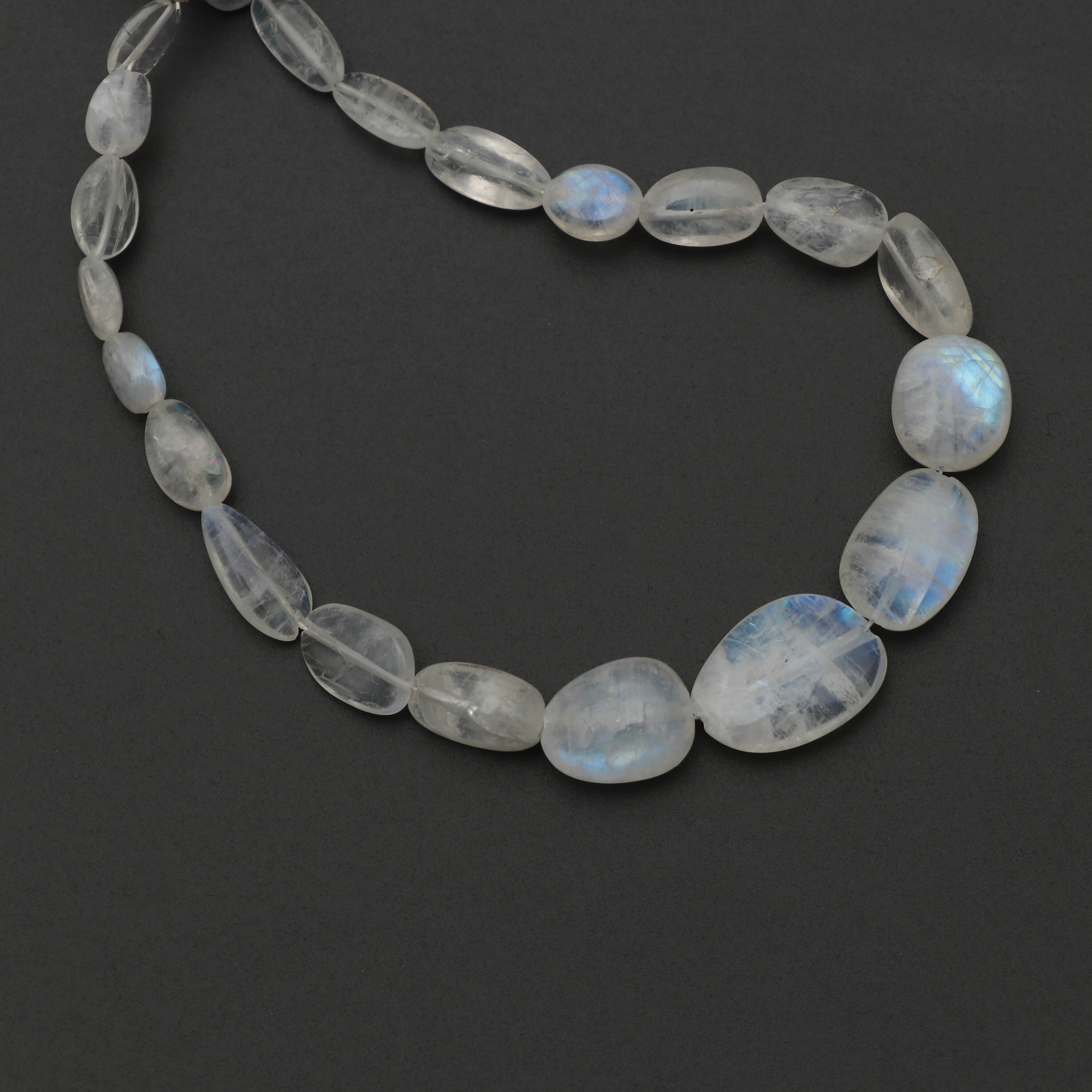 Rainbow Moonstone Smooth Tumble Beads - 5x7 Mm To 11x15 Mm - Rainbow Moonstone - Gem Quality , 8 Inch/ 20 Cm Full Strand, Price Per Strand Rainbow Moonstone Smooth Tumble Beads - 5x7 Mm To 11x15 Mm - Rainbow Moonstone - Gem Quality , 8 Inch/ 20 Cm Full Strand, Price Per Strand