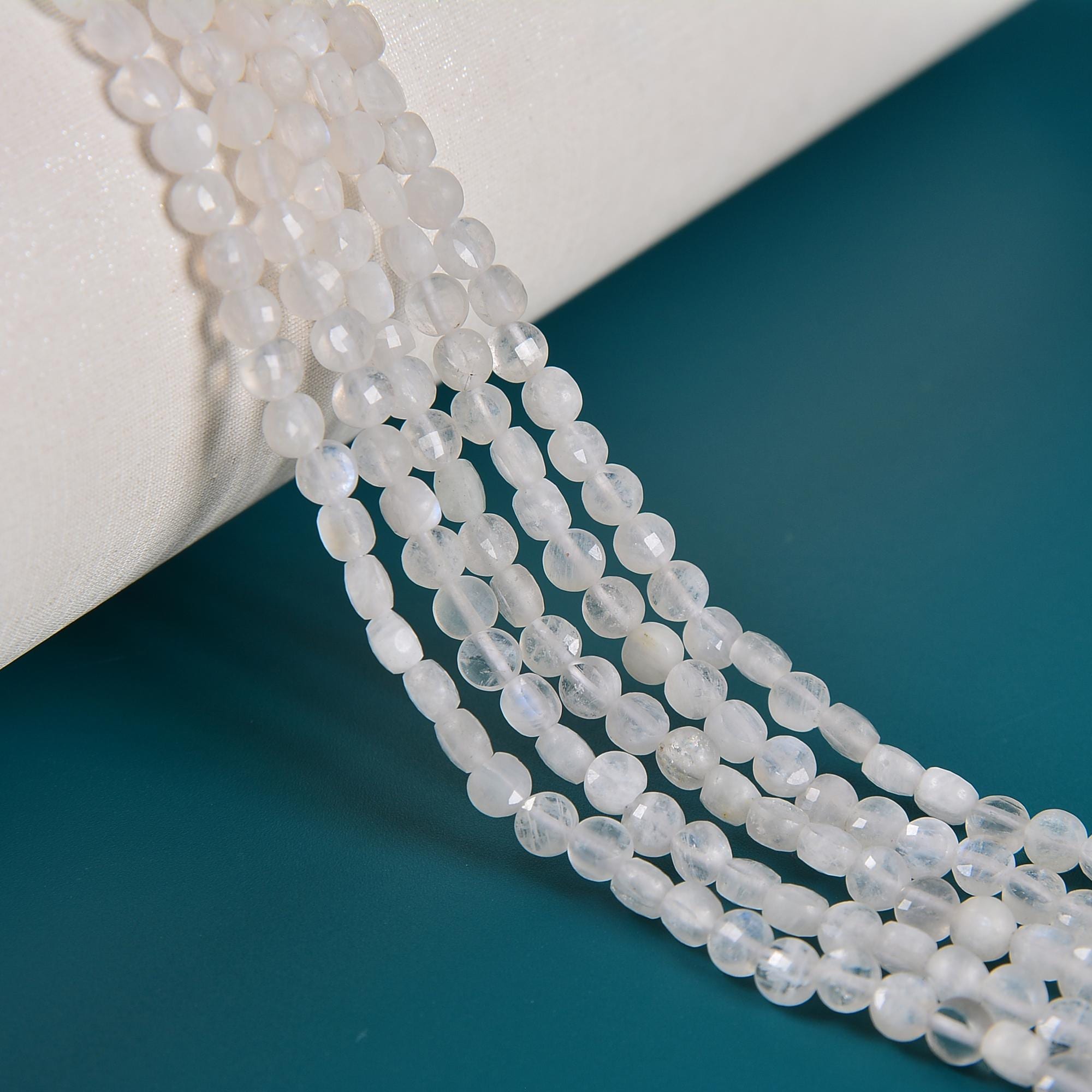 White Rainbow Moonstone Faceted Flat Coin Beads 4mm 15.5" Strand White Rainbow Moonstone Faceted Flat Coin Beads 4mm 15.5" Strand