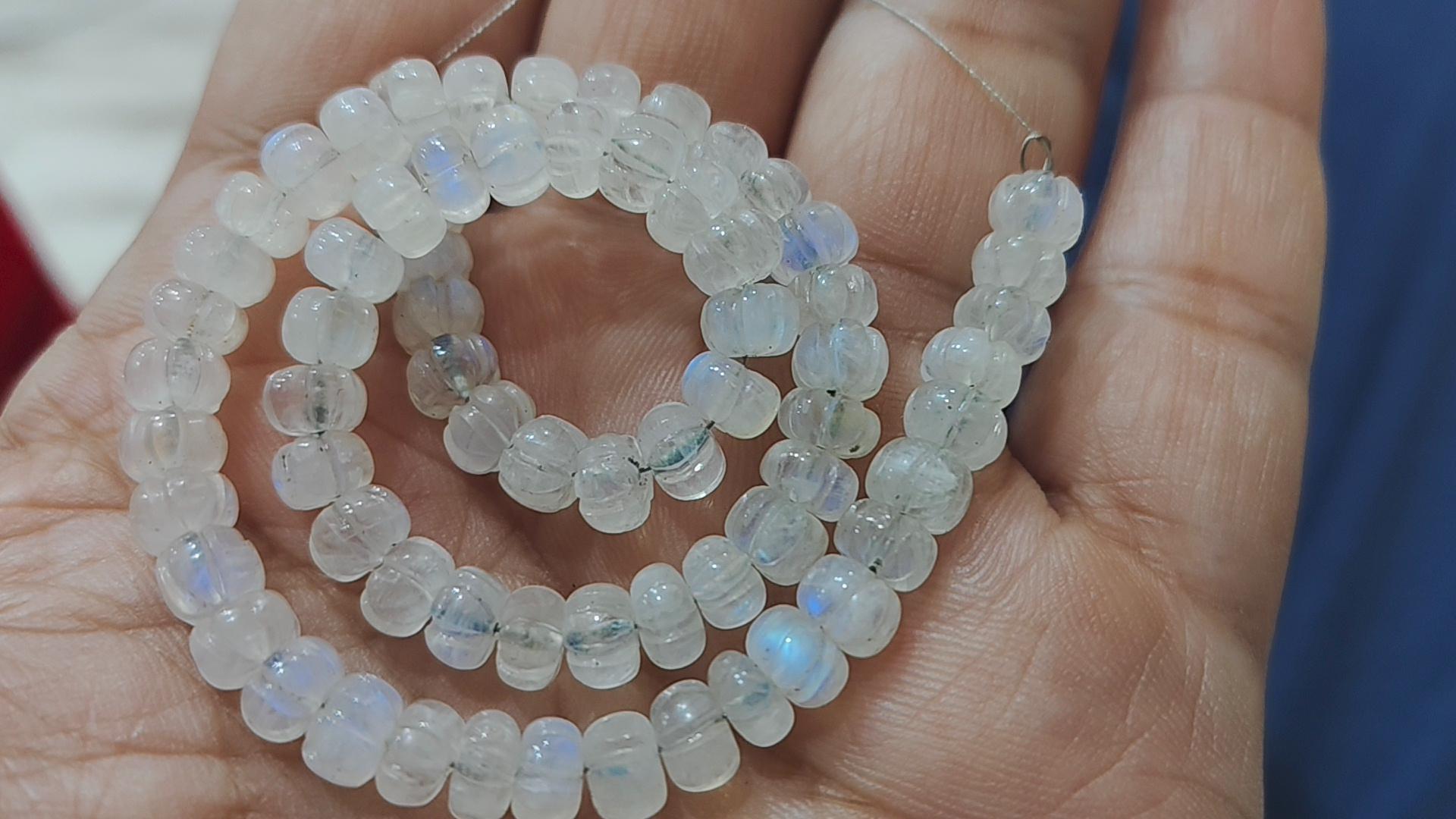 7 Inches Strand, Natural Rainbow Moonstone Smooth Melon Shape Rondelles Size 5-6mm 7 Inches Strand, Natural Rainbow Moonstone Smooth Melon Shape Rondelles Size 5-6mm