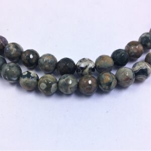 Green Rhyolite Gemstone Beads. 8mm faceted round beads on 15 inch strand. Full strand of AA/AAA Grade beads, 48 per strand. Rainforest. Green Rhyolite Gemstone Beads. 8mm faceted round beads on 15 inch strand. Full strand of AA/AAA Grade beads, 48 per strand. Rainforest.