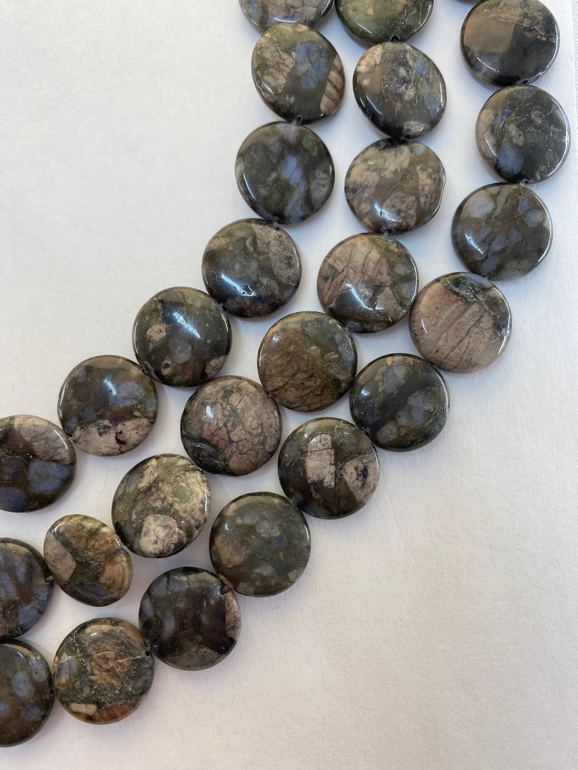 16mm Coin Blue Riolita Gemstone Beads.  15” Strand Of Black, Brown And Blue Coin Beads, 24 Per Strand. A Form Of Rhyolite.