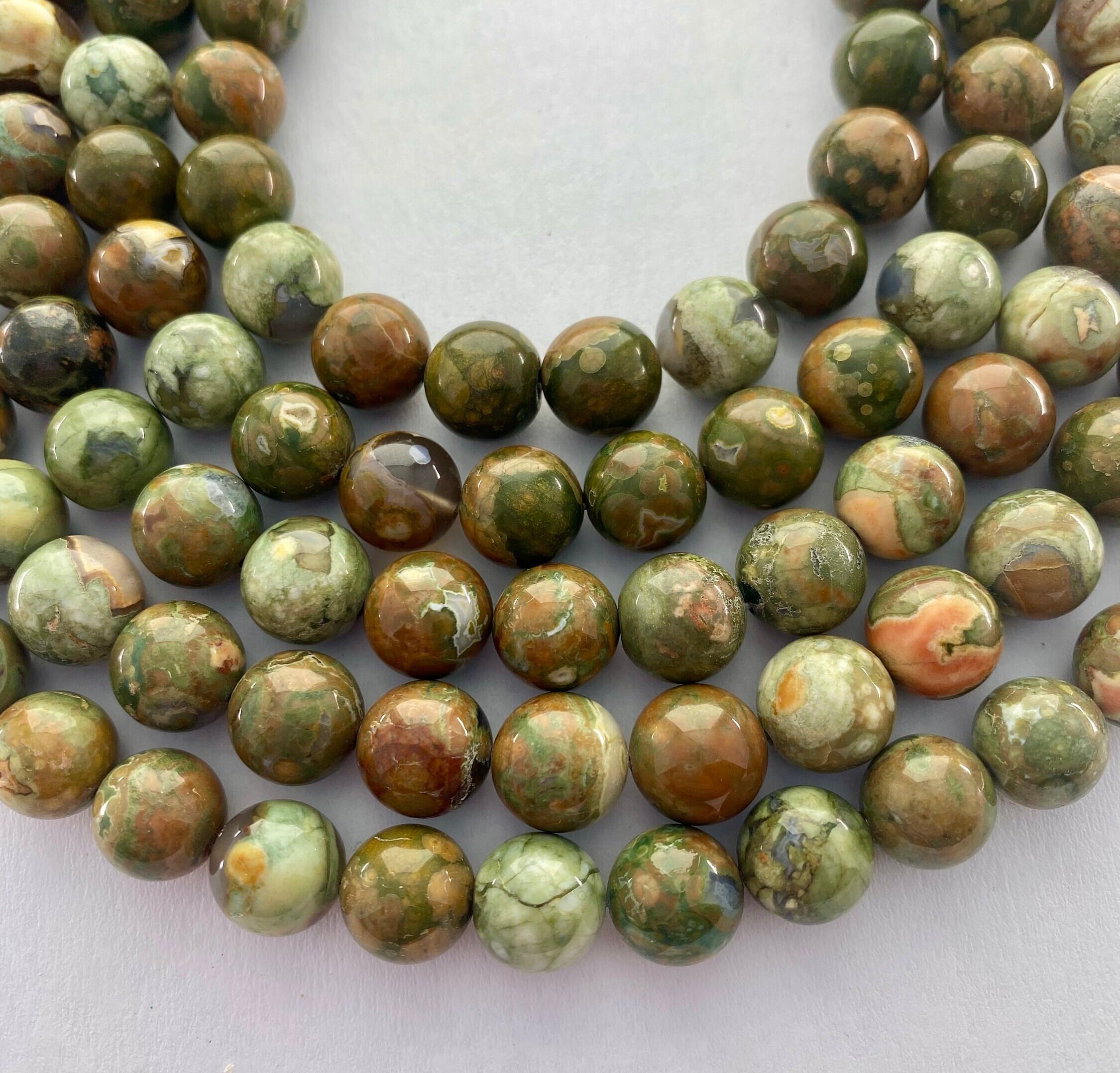 10mm Green Rhyolite Gemstone Beads. 15” Strand Of High Quality Round Beads, About 38 Per Strand. Mix Of Light And Dark Rhyolite. Ryolite.