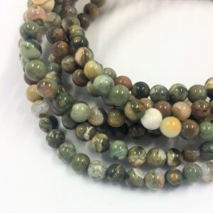 Green Rhyolite Gemstone Beads. 4mm round beads on 15 inch strand. Full strand of AA/AAA Grade beads, about 90 per strand. Rain forest Stone Green Rhyolite Gemstone Beads. 4mm round beads on 15 inch strand. Full strand of AA/AAA Grade beads, about 90 per strand. Rain forest Stone