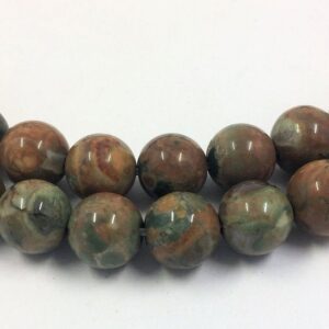 Green Rhyolite Gemstone Beads. 10mm round beads on 15 inch strand. Full strand of AA/AAA Grade beads, about 38 per strand. Rain forest Stone Green Rhyolite Gemstone Beads. 10mm round beads on 15 inch strand. Full strand of AA/AAA Grade beads, about 38 per strand. Rain forest Stone
