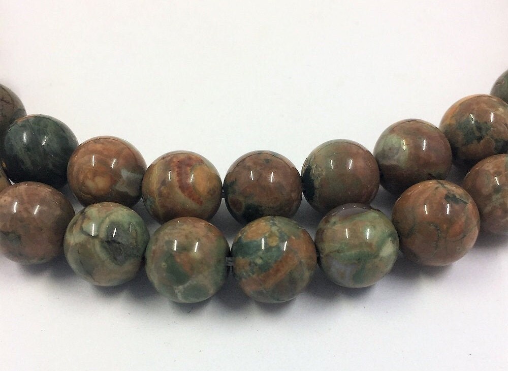 Green Rhyolite Gemstone Beads. 10mm Round Beads On 15 Inch Strand. Full Strand Of Aa/aaa Grade Beads, About 38 Per Strand. Rain Forest Stone Green Rhyolite Gemstone Beads. 10mm Round Beads On 15 Inch Strand. Full Strand Of Aa/aaa Grade Beads, About 38 Per Strand. Rain Forest Stone