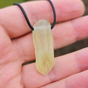 Rare green clear calcite crystal pendant from China Rare green clear calcite crystal pendant from China